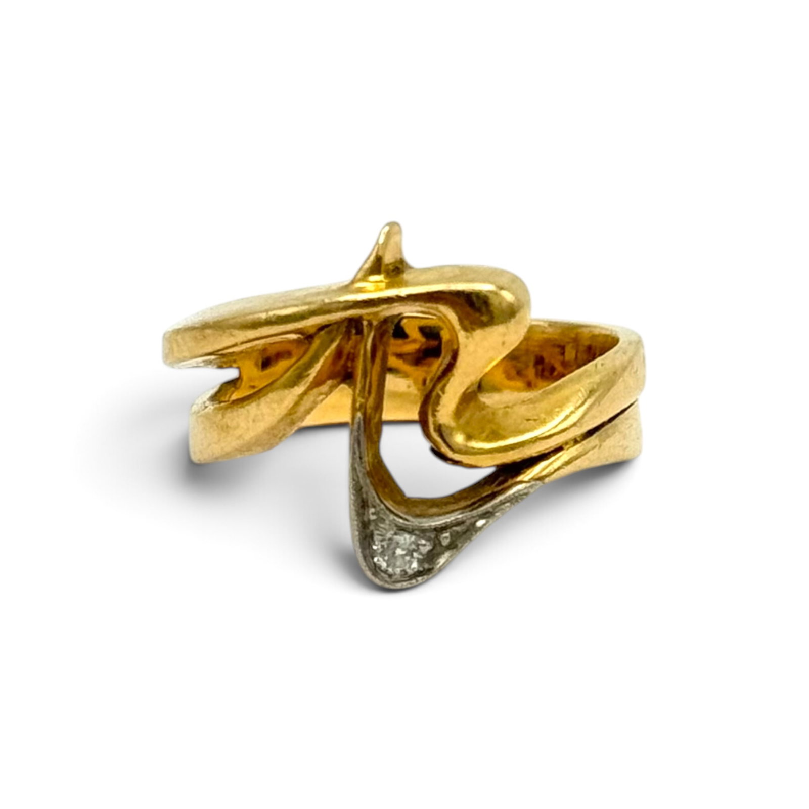 Diamond, 14k Yellow and White Gold Ring: Featuring one old European-cut diamond weighing approximately 0.03 ct., set in an sculptural, 14k yellow and white gold ring mounting, size 5 3/4. Gross weight: 5.8 grams.