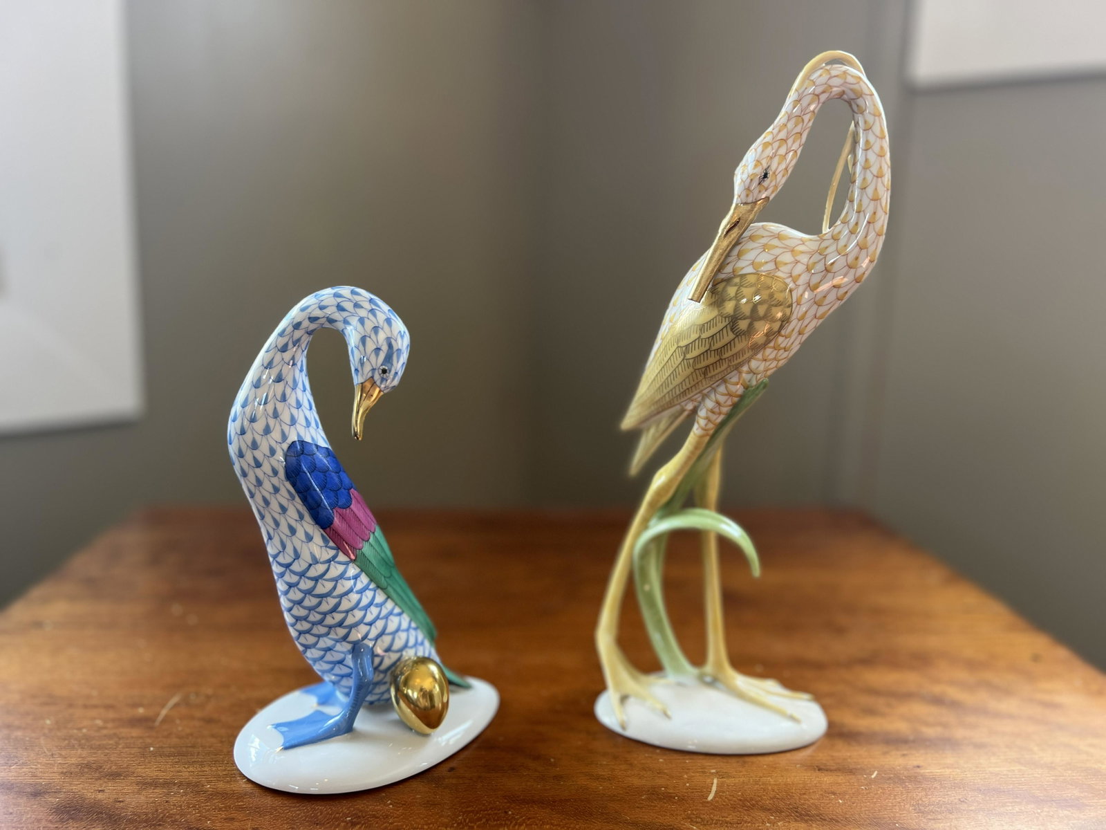 2 Herend Hungarian Porcelain Hand-Painted Birds: 11" (tallest). One is missing its beak. Otherwise no chips or cracks.