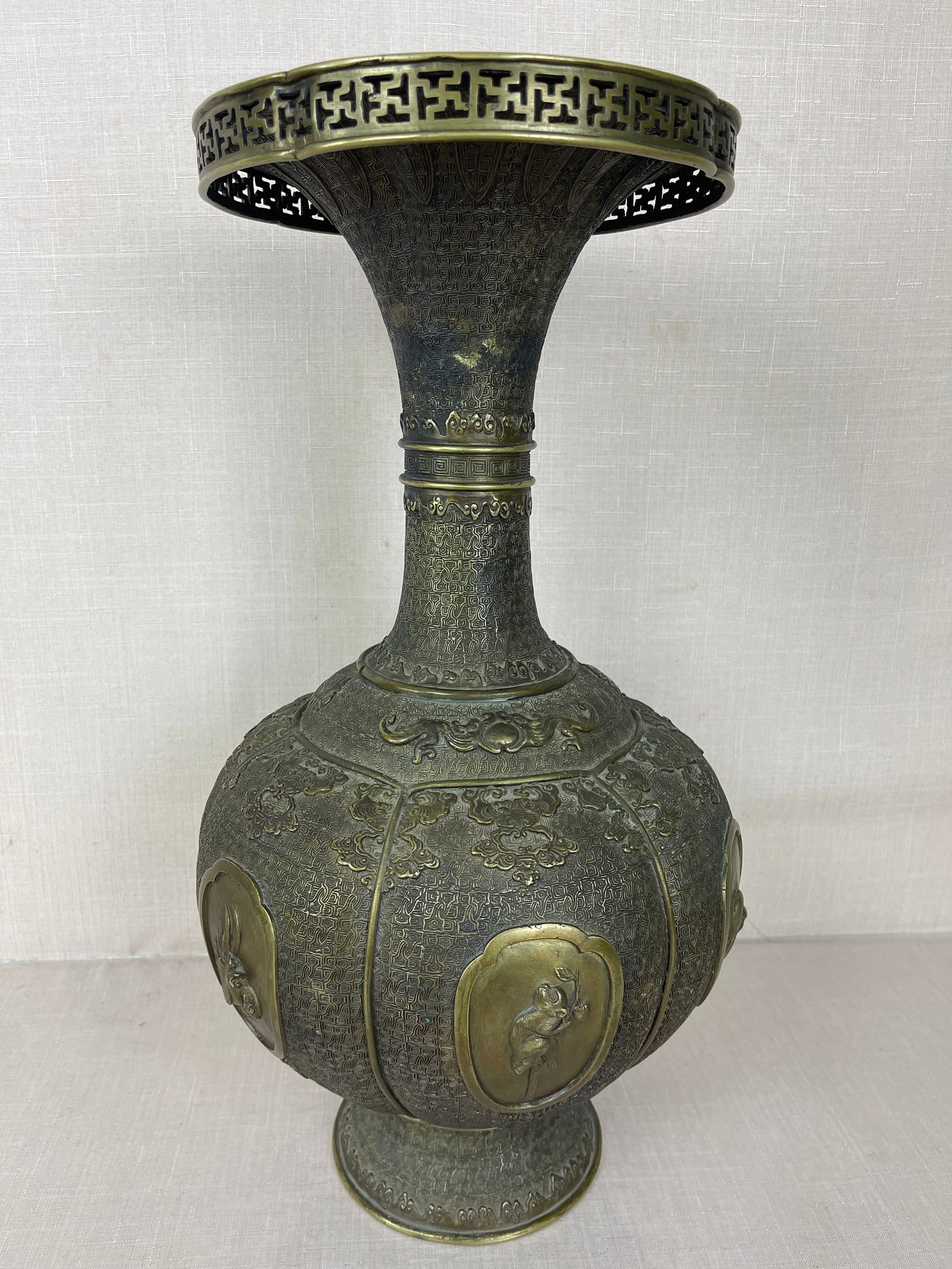 Antique Japanese Bronze Urn: Signed (on bottom). Good condition. Has two holes drilled in neck at base. Ht: 20"