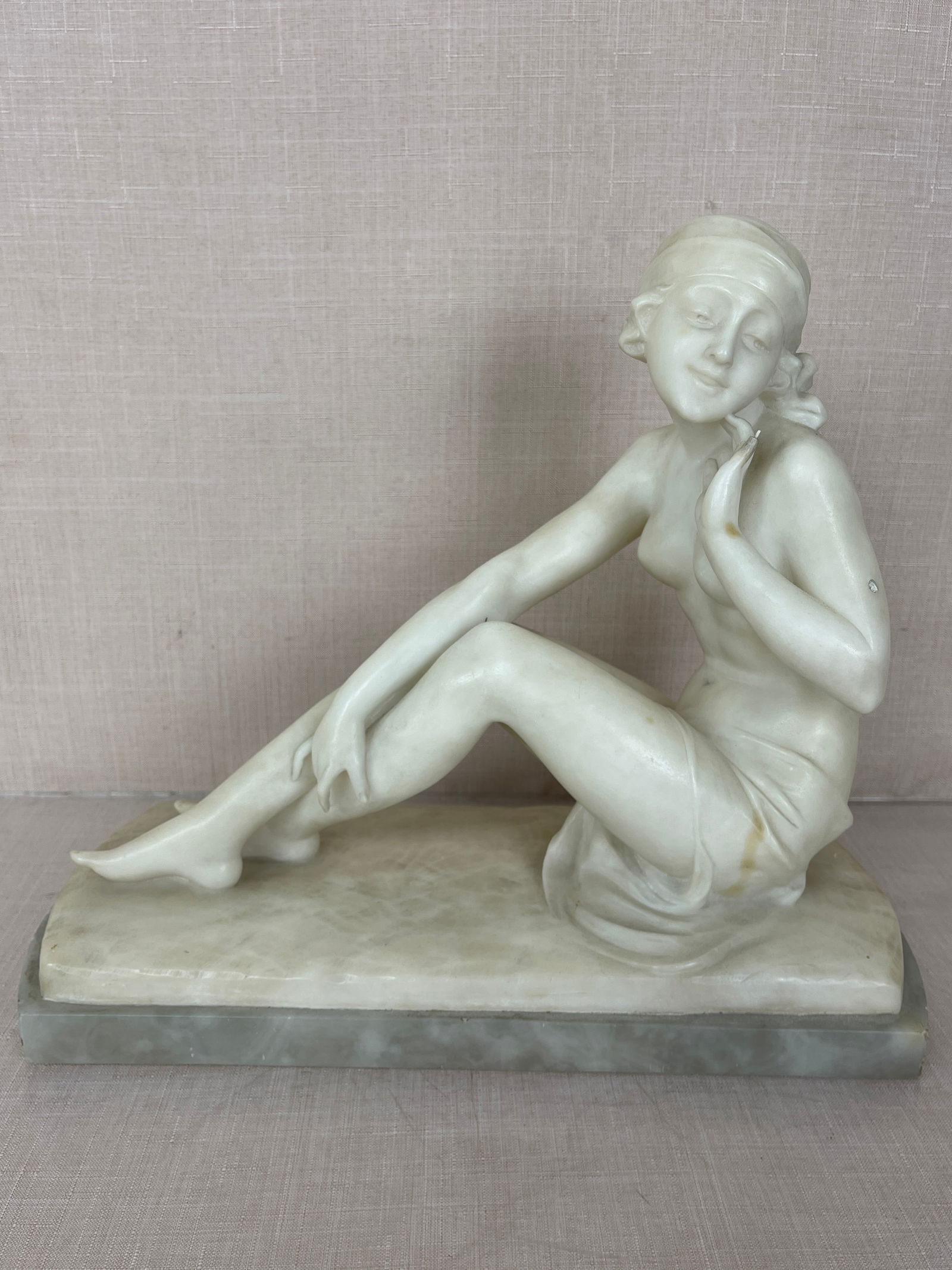 Art Deco Alabaster Sculpture of a Woman: Unsigned. Good condition. Has minor damage to hand. Ht: 11.5"