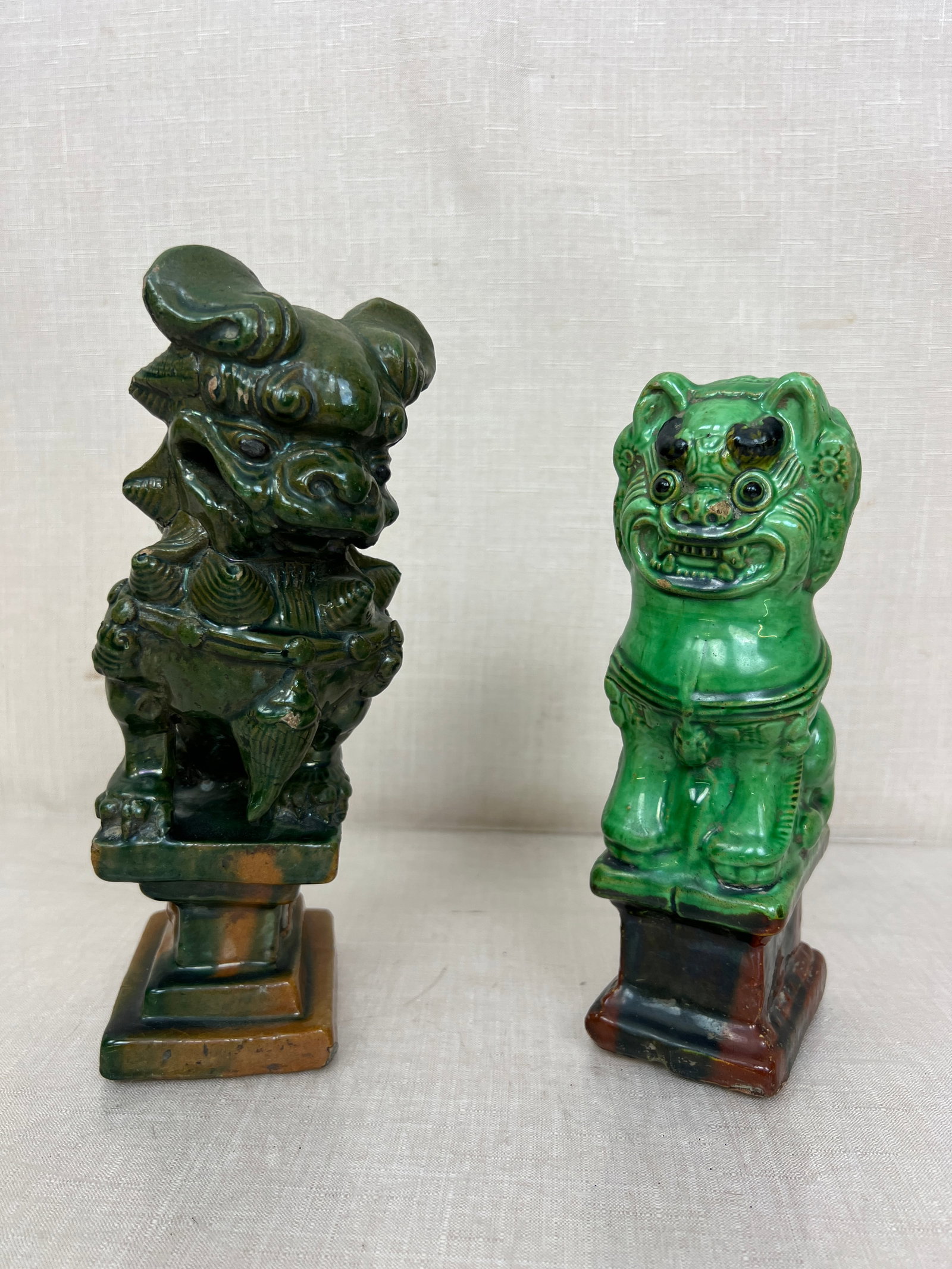 Chinese Ceramic Foo Dogs: Both have chips. Ht: 9.5" max.