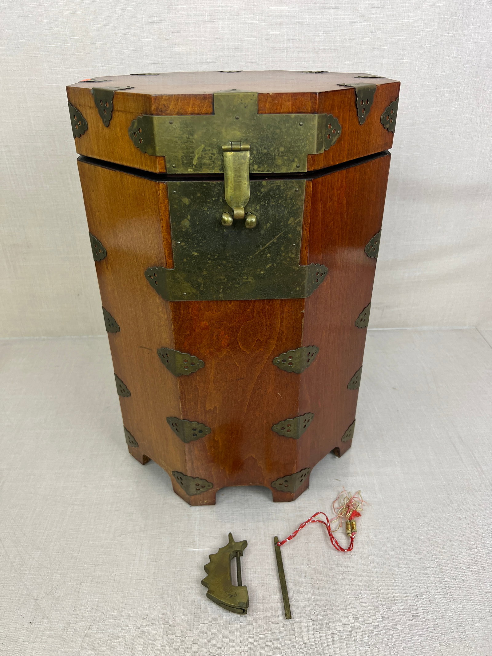 Chinese Octagonal Wooden Storage Box: Comes with lock and key. Some fine scratches on the top. Ht: 19"