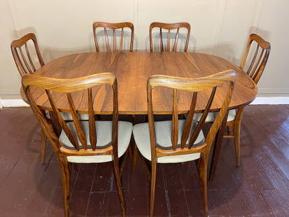 Niels Koefoed Mid-Century Modern Table & Chairs: Signed on chairs, excellent condition. Comes with two leaves. Ht: 29", Length: 45", Width: 45". Leaves: 15"