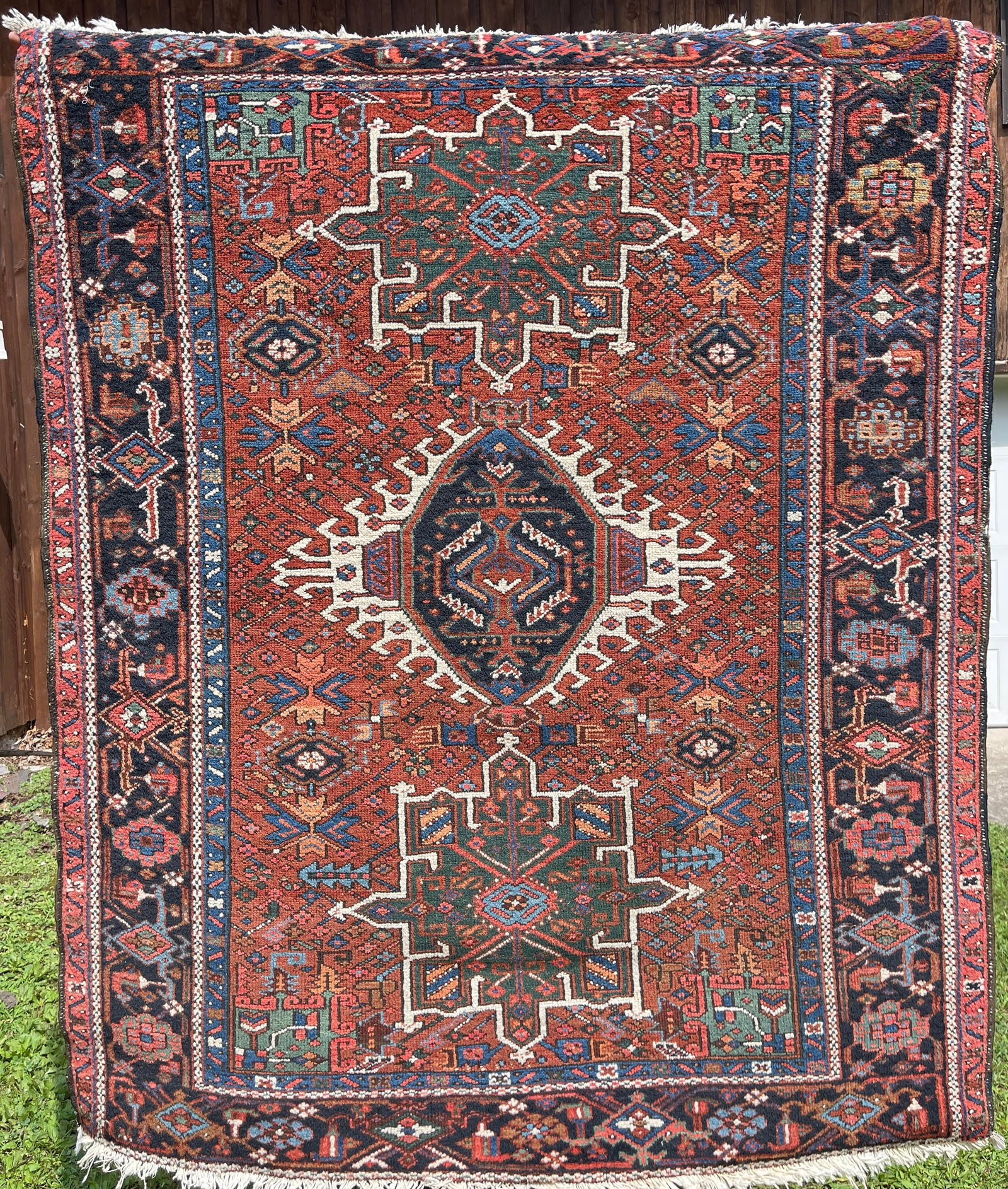 Antique Heriz Area Rug: Some wear and discoloration. Overall, good condition. 5'7" x 4'10"