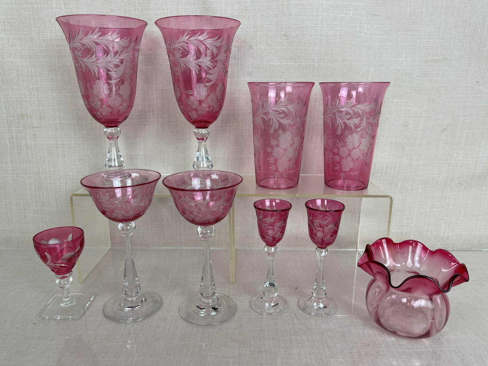 Assortment of Cranberry Steuben Drinkware: All signed on bottom, no cracks or breaks. Ht: 7.5" max.