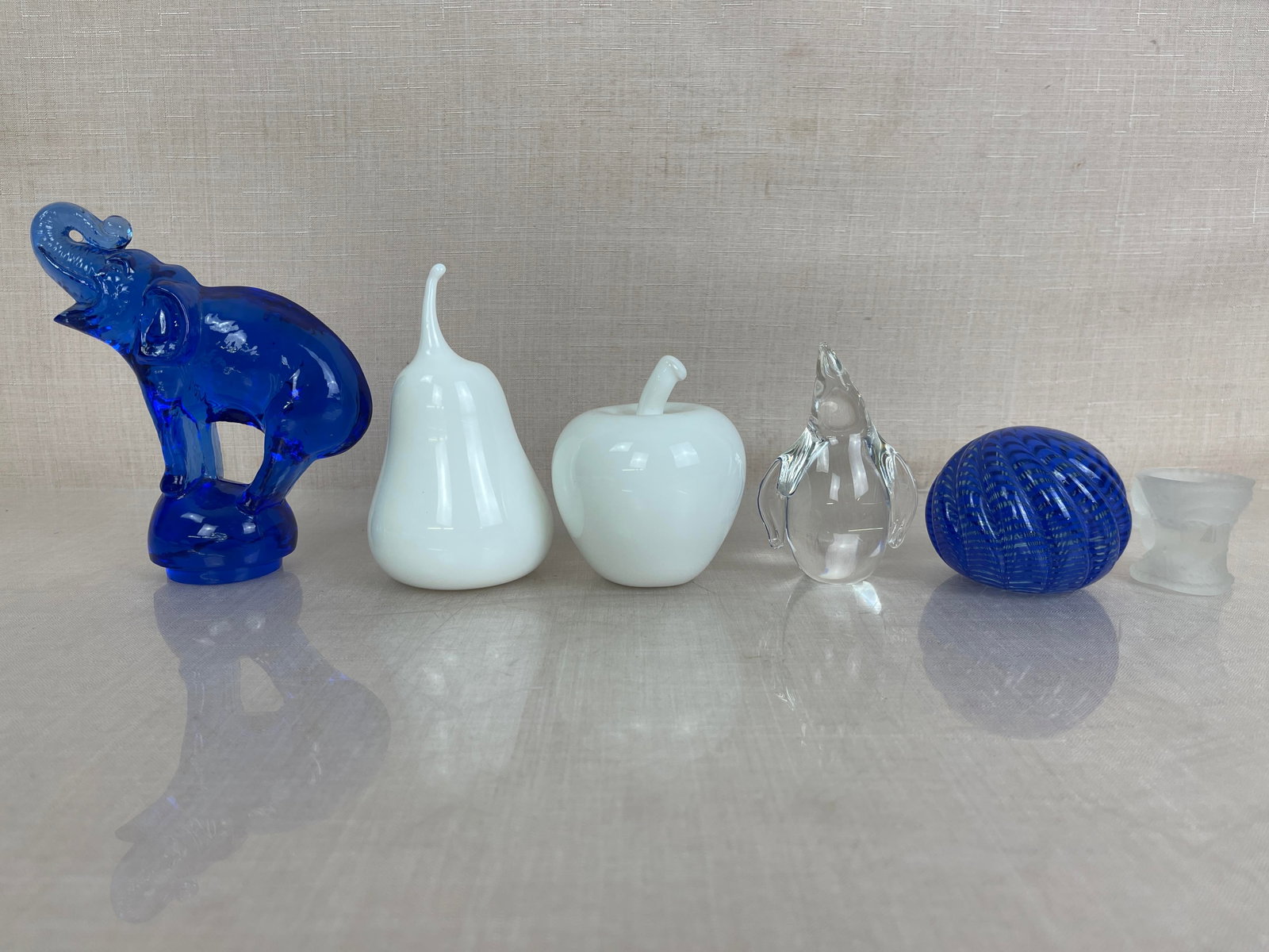 Milk Glass and Art Glass Paperweights: One piece marked Steuben, one piece marked O.B.G. Ht. 5.75" max.