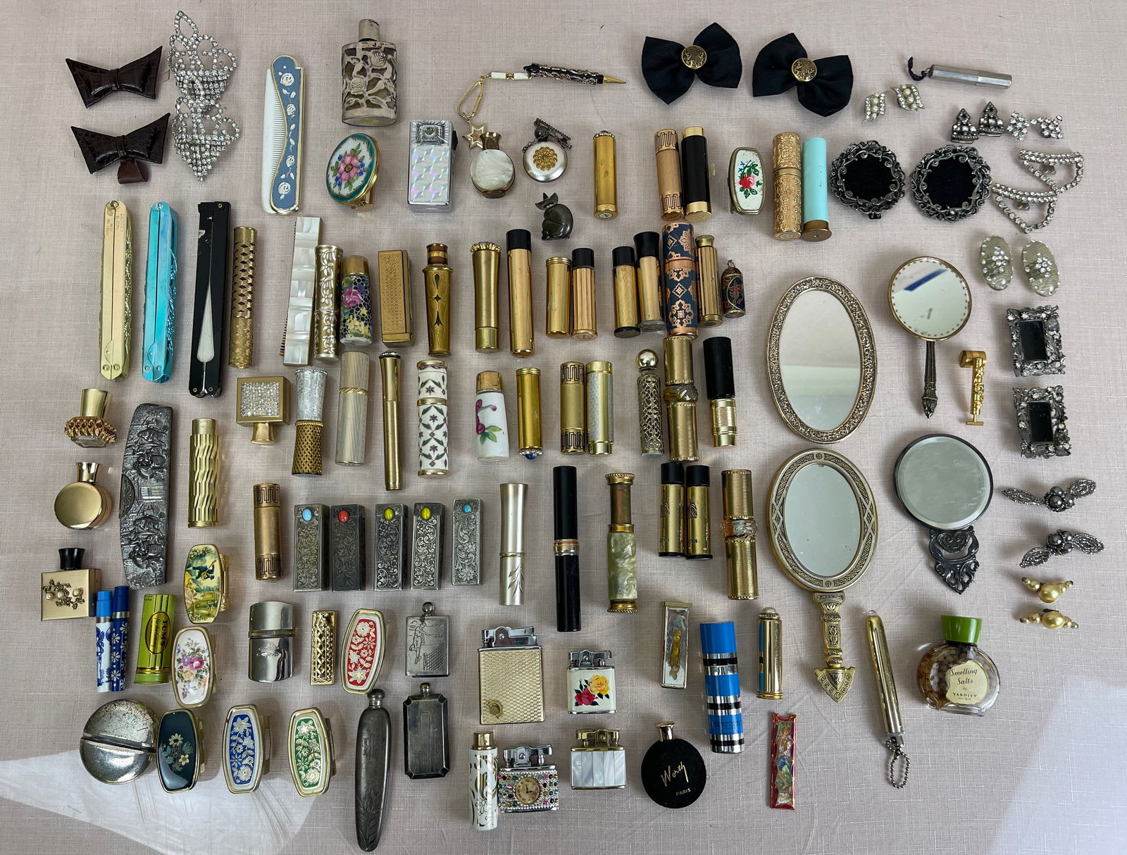 Large Collection of Women's Vintage Vanity Items: Includes lighters, lipstick cases, jewelry, and perfume bottles.