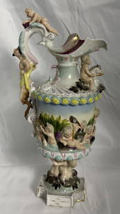 Meissen Ewer Figural High Relief with Mythical Sea Creatures: Classical Meissen piece with all the bells and whistles. Lots of mythical figures cavorting all over this ewer. Meissen crossed swords mark on the bottom. May have some small old repairs..I was told t