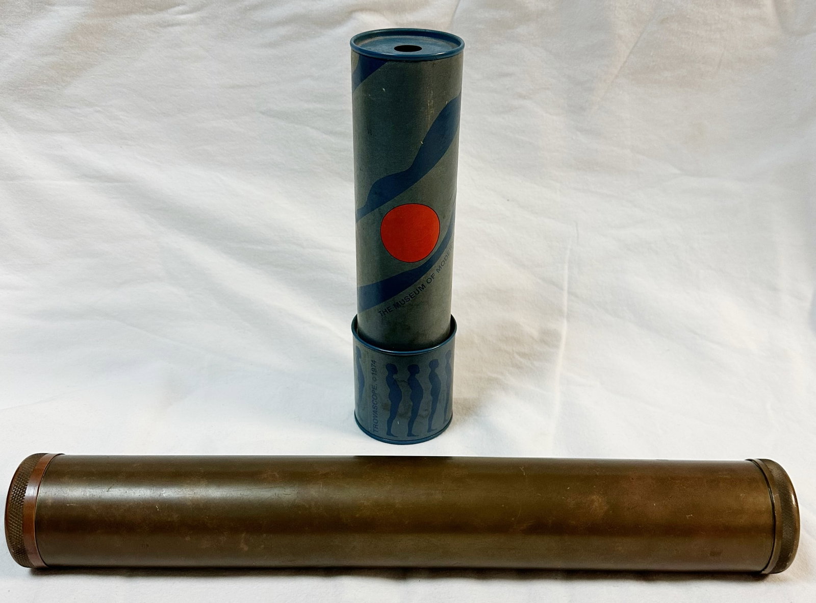 Two Vintage Kaleidoscopes: Two vintage kaleidoscope, one from the Metropolitain Museum of Art and one much older one all brass. Optics are clear as I was even able to capture the image with my iPhone.