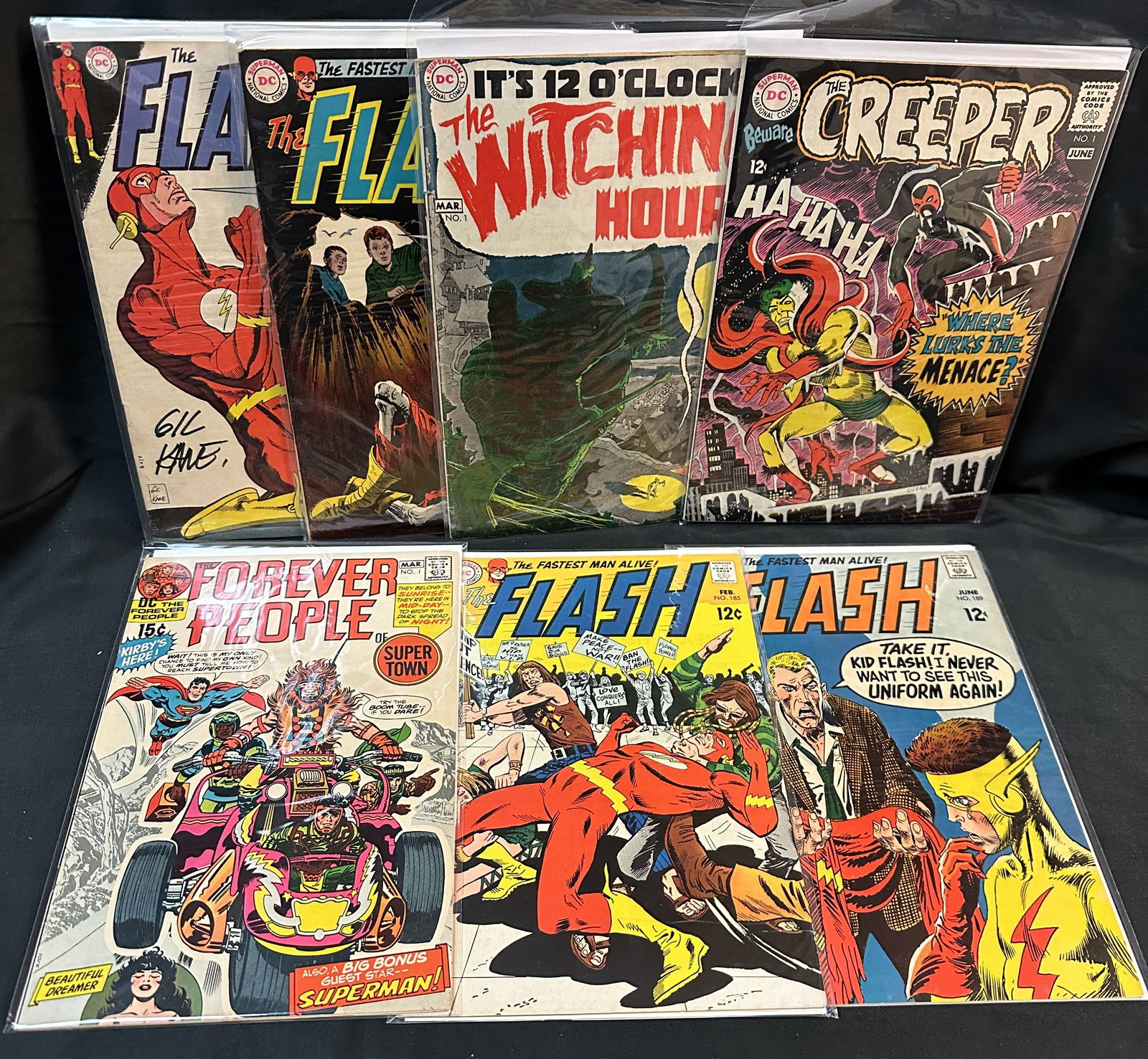 Seven DC 12c and 15c Comic Books Steve Ditko and Jack Kirby Art #1 issues (1 of 8)