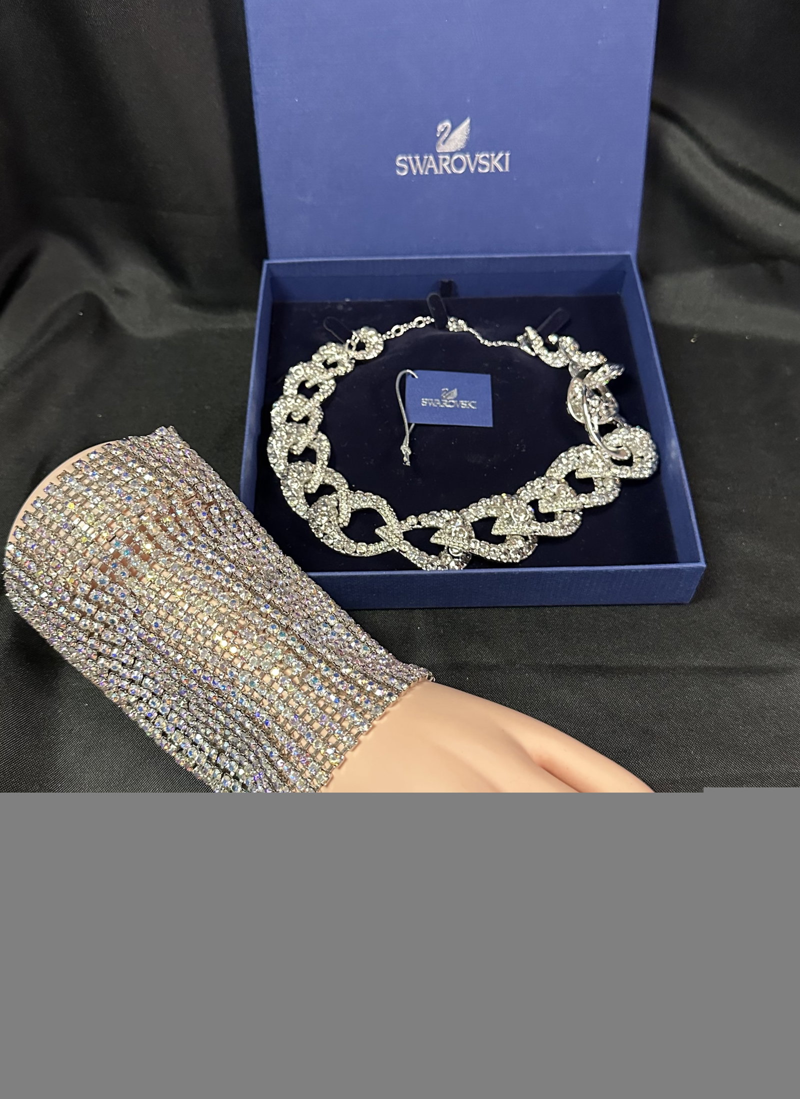 Crystal Jewelry Sworovski + 1: A glittering Swarovski crystal necklace, new in the box with the tags along with a gorgeous crystal elaborate statement piece that goes on your forearm. More like a bracer than a bracelet. Stunning cr