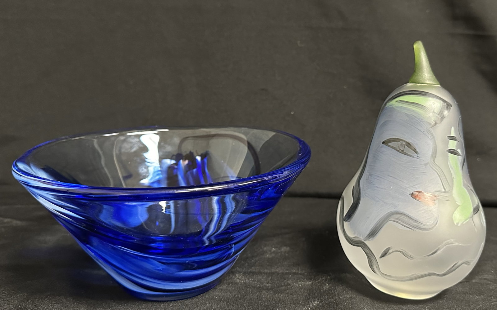 Kosta Boda Painted Glass Pear and Blue Swirl Bowl: A great Kosta Boda Sweden blue and white swirl art glass fruit salad serving bowl with etched mark on the bottom as well as a glass pear painted by Ulrica Hydman Vallien