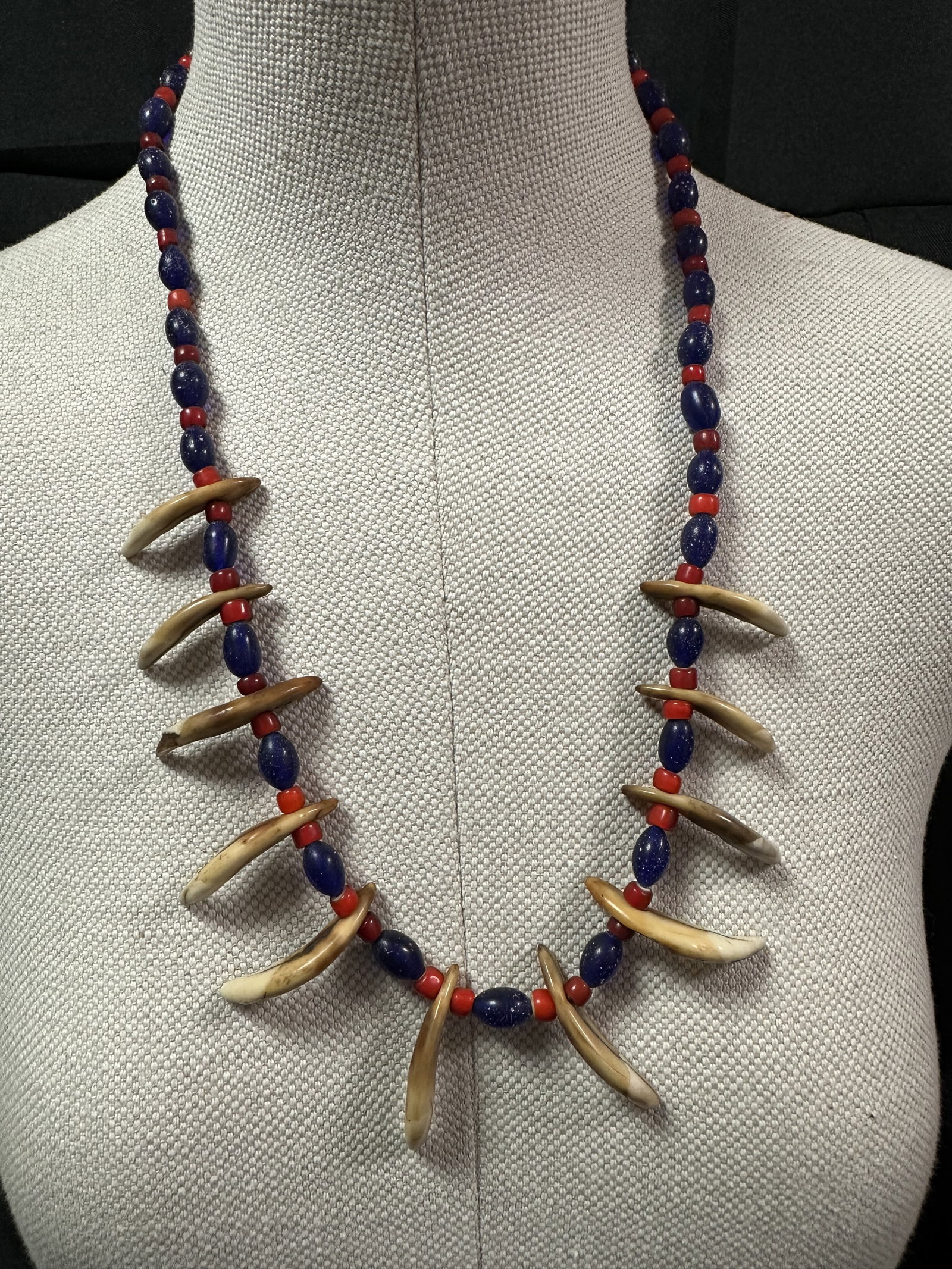 Hudson Bay - Wolf Tooth Trade Bead Necklace: Uncommon trade bead necklace decorated with wolf teeth. Trappers in Canada Im sure had to contend with wolves all the time and this would make a nice trophy necklace. The Hudson Bay company has been a