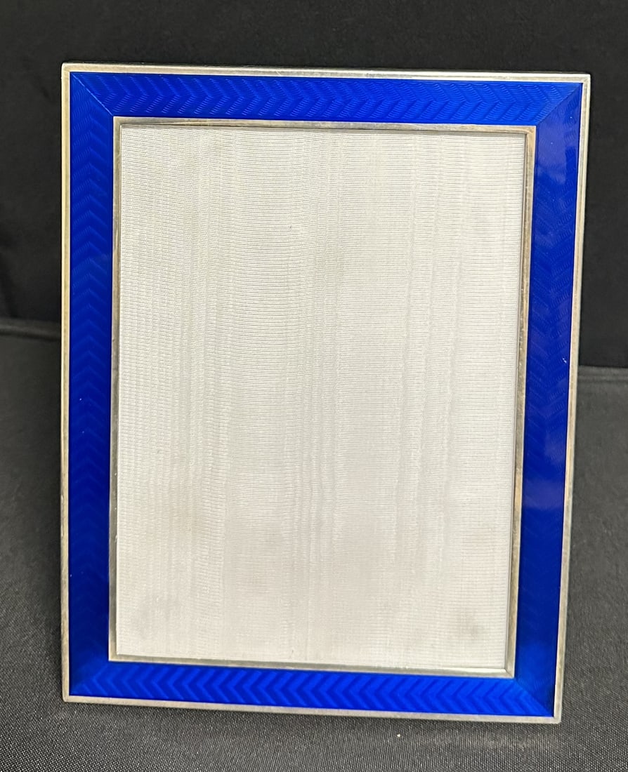Italian Sterling Silver and Enamel Photo Frame 6 x 8: Stunning Italian sterling silver and guilloche enamel frame in wonderful condition. This frame is suitable for 6 x 8 inch photographs and will ad elegance and class to any photo it houses.