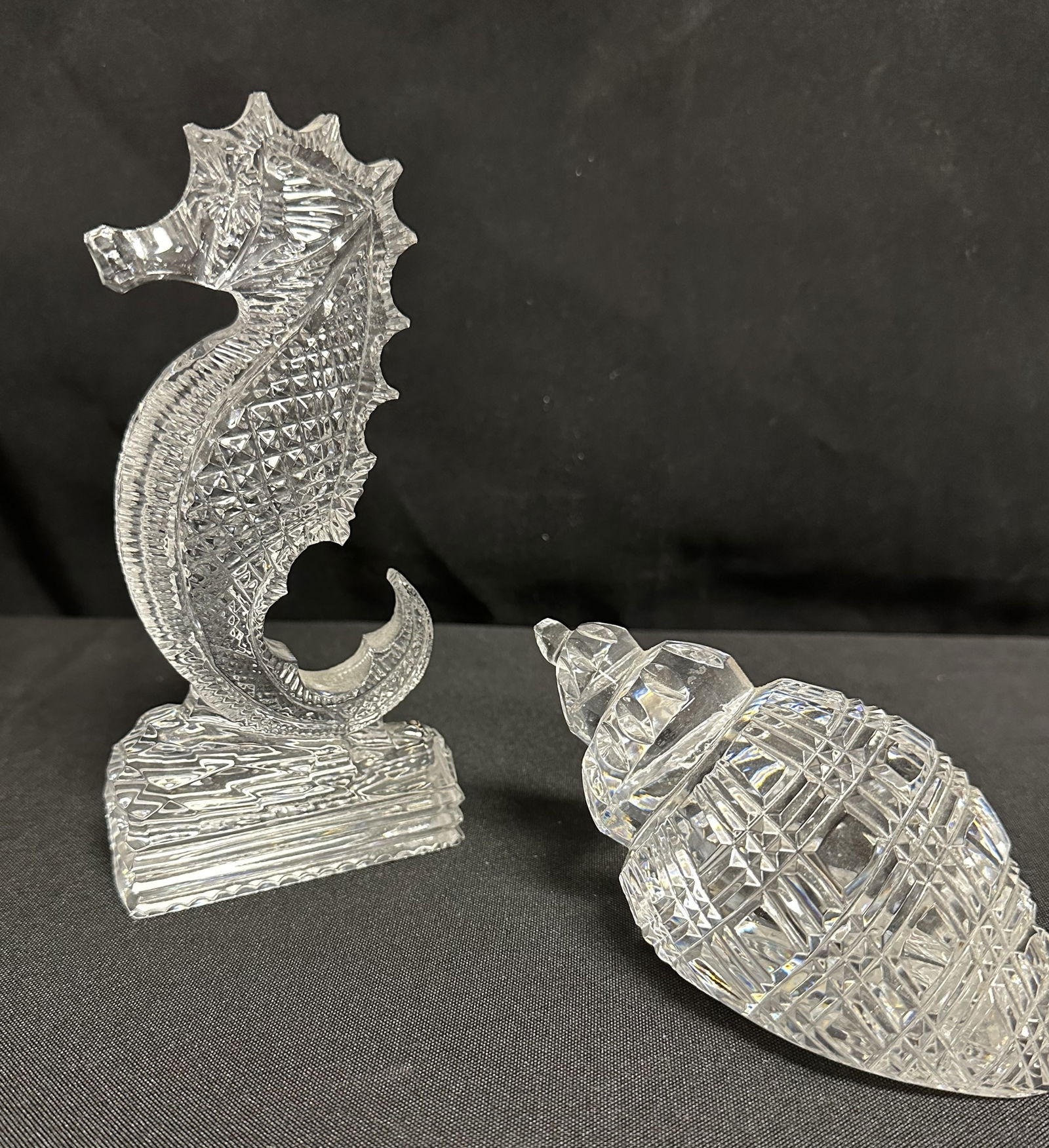 Waterford Seahorse and Seashell Paperweights: Beautiful Waterford crystal figures. A well defined seahorse measuring almost 7 inches tall and a seashell just under 5 inches long. In good condition as you can see.
