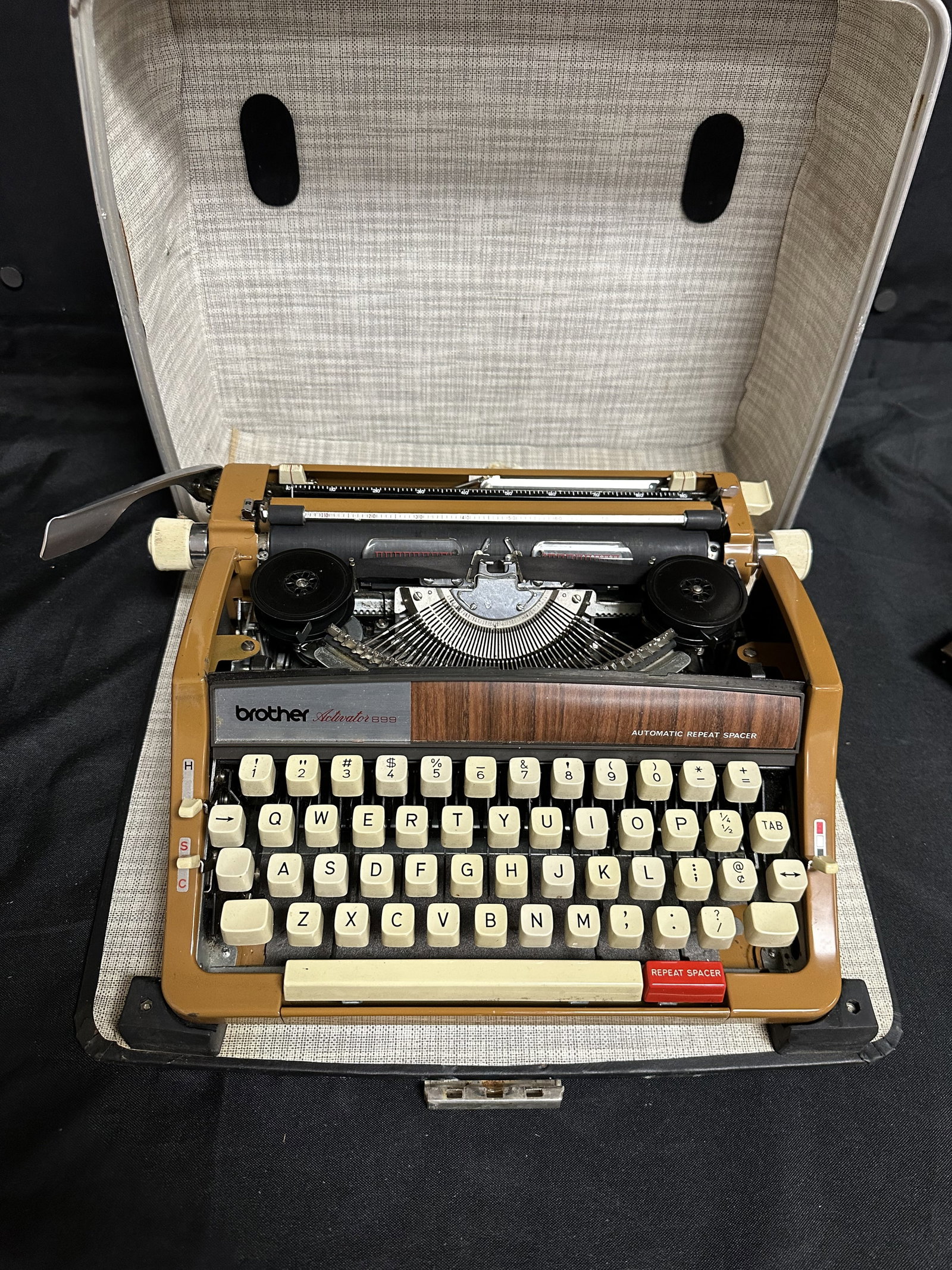 1972 Brother Activator 899 Typewriter with Case: Vintage Brother Activator 899 Typewriter with automatic repeat spacer. This typewriter seems to be in good working order only the ribbon is dried out so I couldnt do a typing sample. Great 70s look an