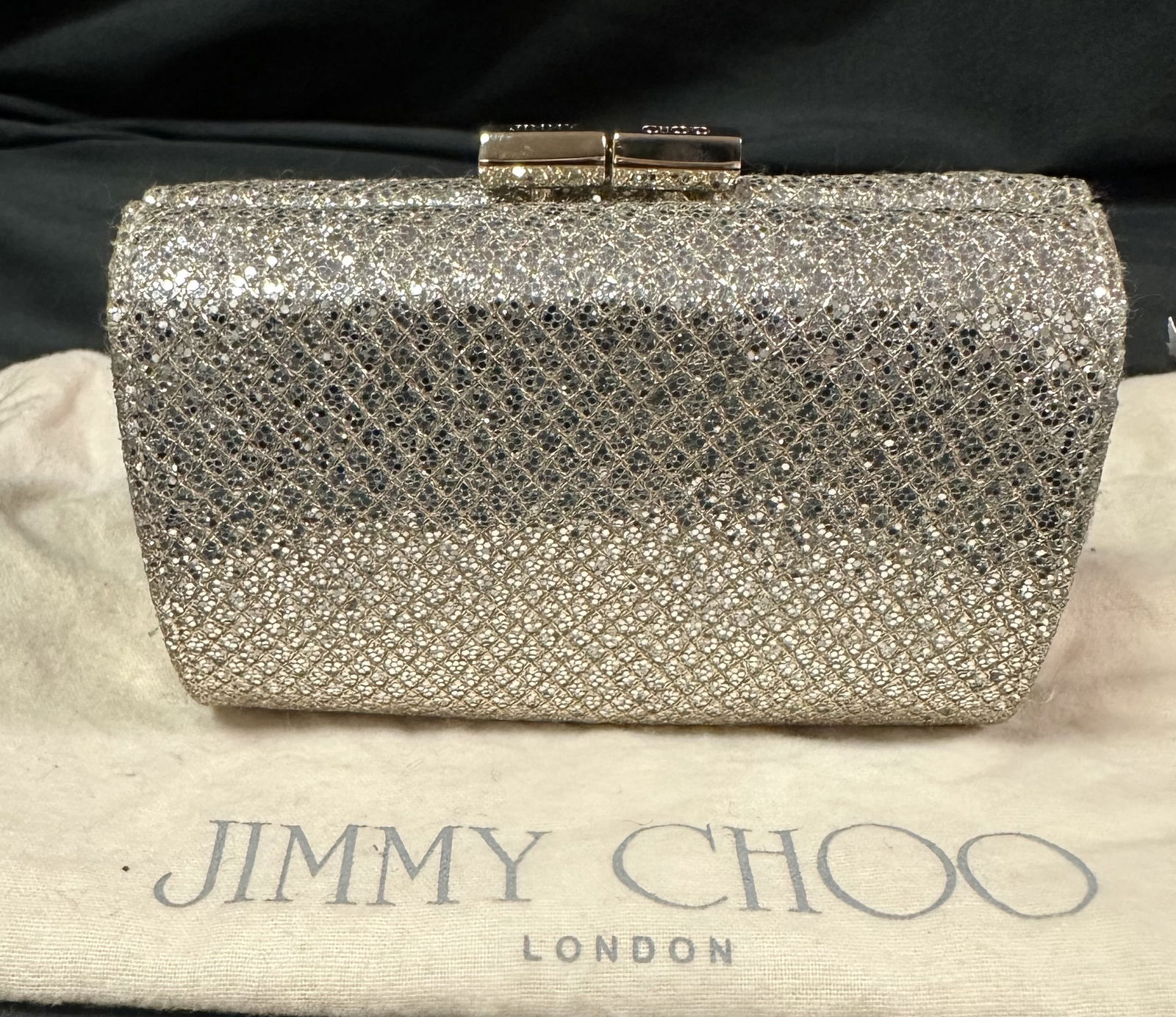 Jimmy Choo Silver Cluch Purse with Pouch: Jimmy Choo evening silver clutch purse in great condition with the original pouch.