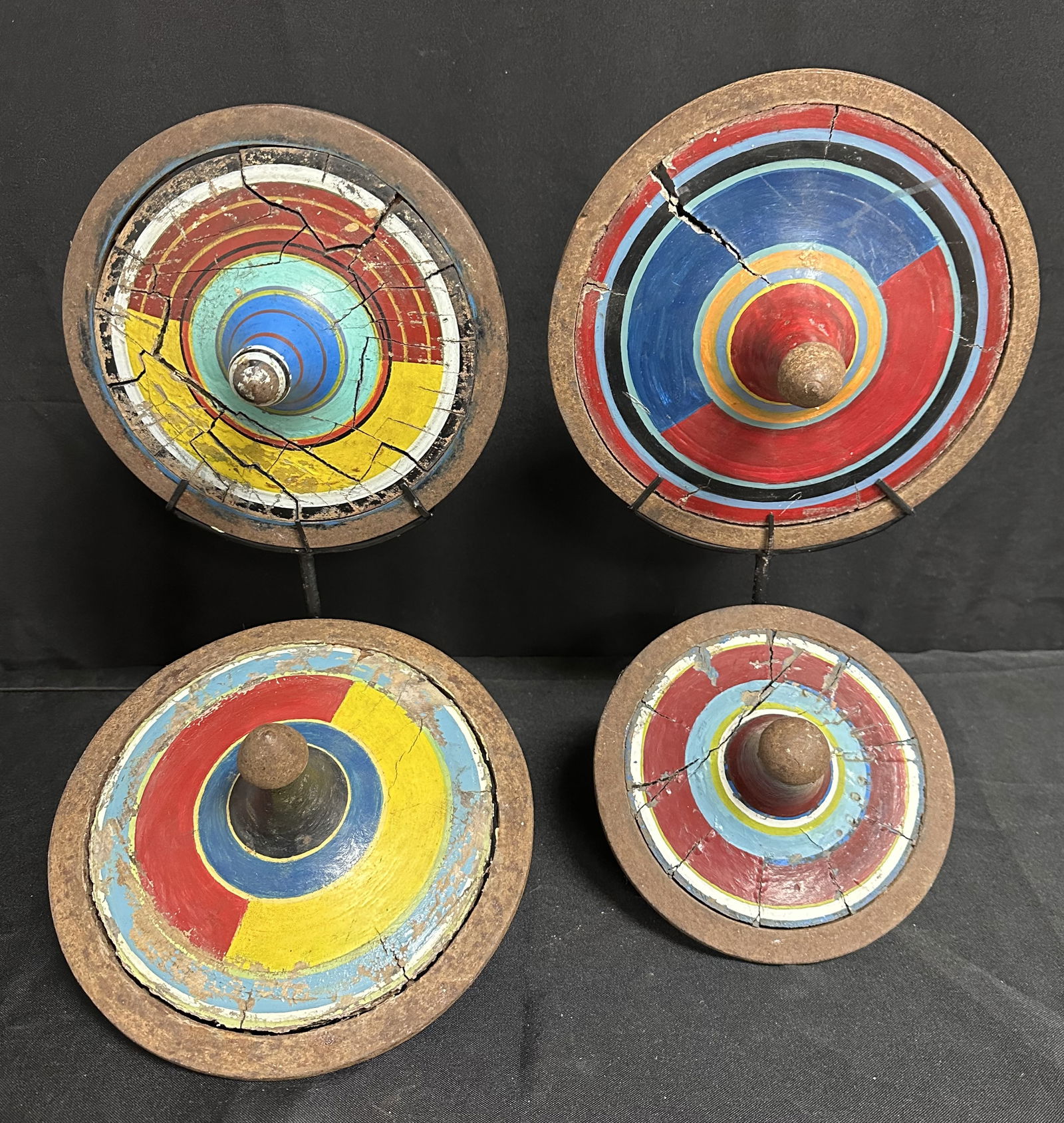 Brightly Painted Vintage Toy Tops Two on Museum Stands (1 of 7)