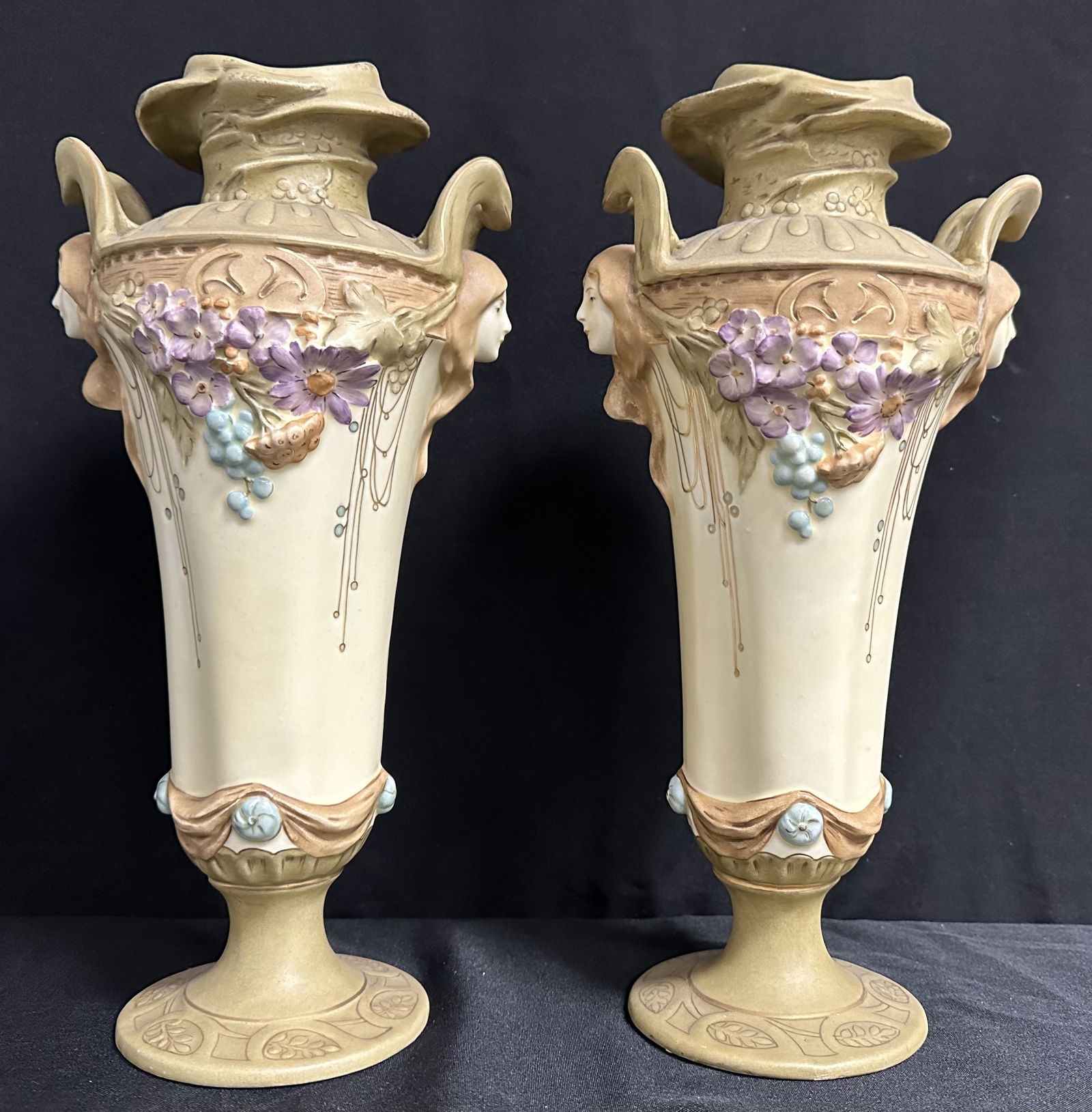 Pair of Art Nouveau Amphora Vases: Nice pair of art nouveau vases measuring about 13 1/2 inches tall. I found a very similar vase marked for Royal Dux but this one seems just a little bit finer and doesnt have the same Royal Dux mark.