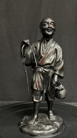 Oriental Cast Figure of a Happy Fisherman