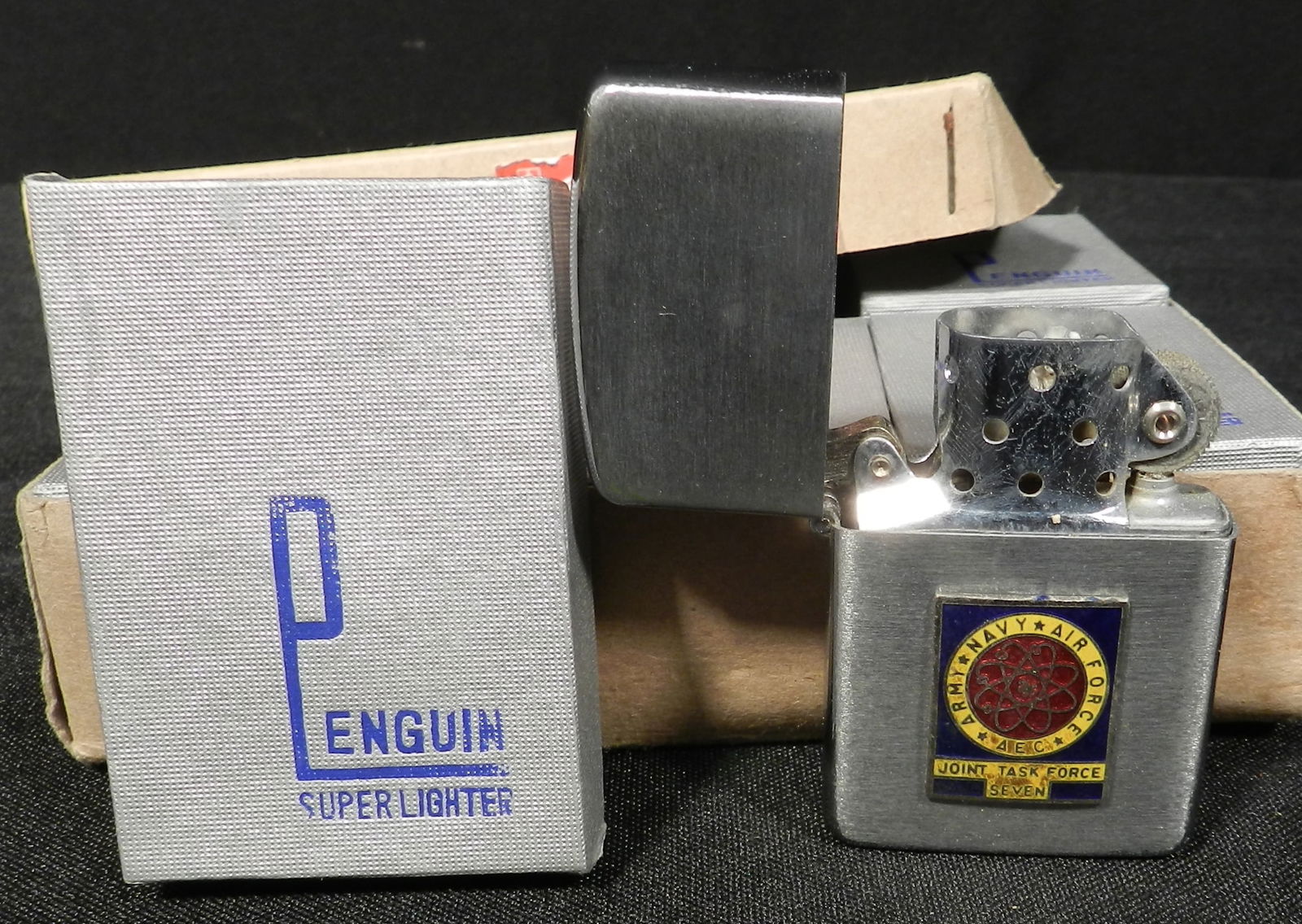 Box of 12 Penguin Military Lighters Joint Task Force Seven - Nuclear Testing (1 of 5)