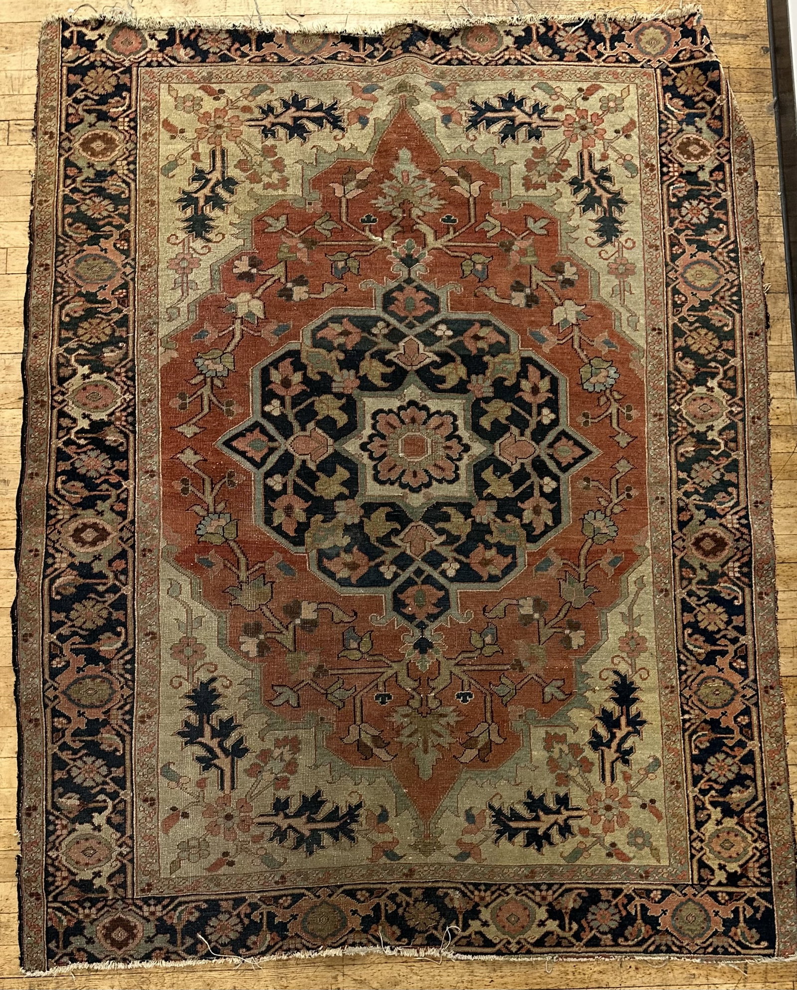Persian Rug - Larger 77 x 57: Vintage/Antique Persian Rug (Heriz?). Measures 77 inches by 57 inches. Please be sure to examine photos for condition.This auction is using LiveShipping however local pick-up is available and encourag