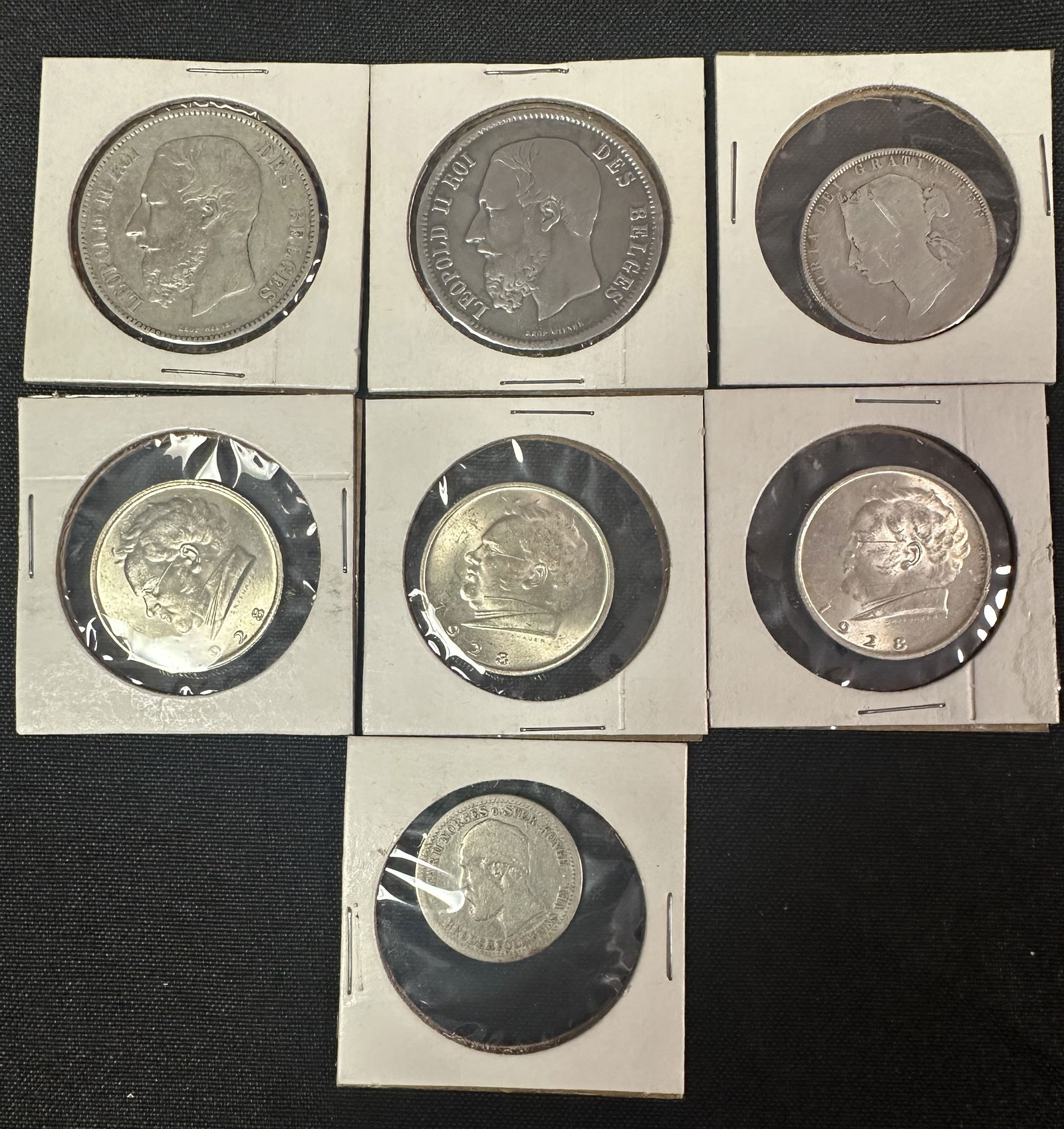 Seven Assorted International Silver Coins (1 of 2)