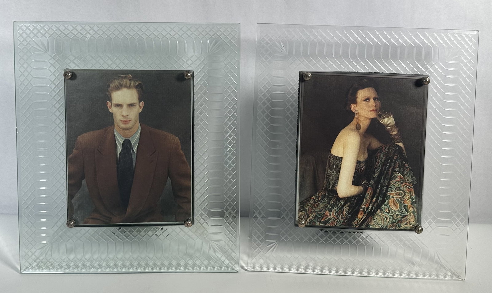 RR Two Large Glass Modern Frames: Two Large Glass Modern Frames Two large contemporary etched glass frames measuring 16 inches tall. Perfect to add class to any area with a clean modern look but still with a large presence. For this