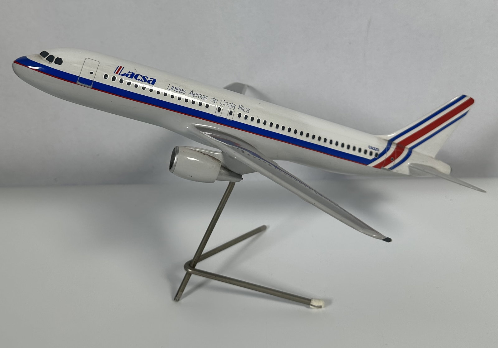 French Lacsa Air Model of a Plane from Travel Agent Office: French Lasca Air Model of a Plane from Travel Agent Office This is a model of a Lacsa airplane by Graphideco. Graphideco is a premier manufacturer of high-end, 1:100 scale and larger airline display