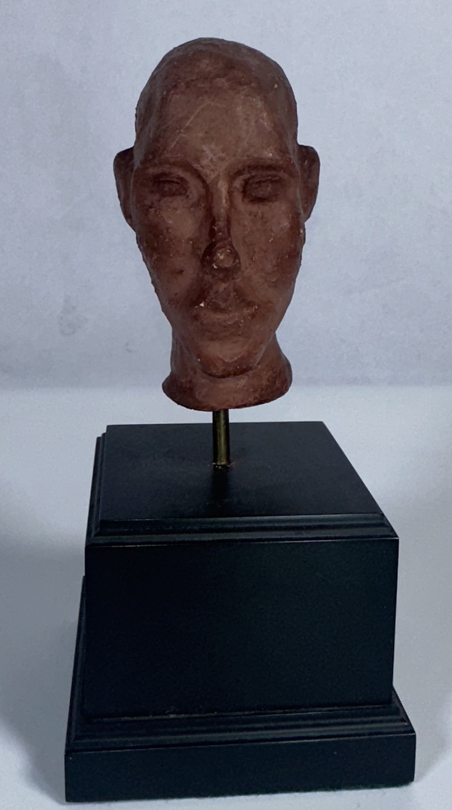 Jane Batley Bowles Head Sculpture: Jane Batley Bowles Head Sculpture This sculpture is titled Untitled (rust Head) 2, created by the Australian contemporary artist Jane Batley Bowles. Crafted from plaster, patina, and pigment, then
