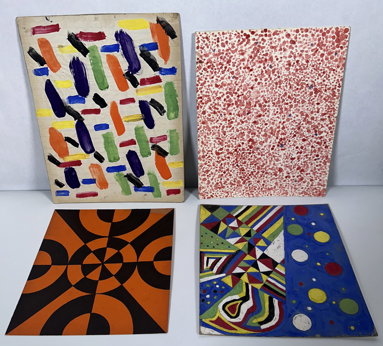 Four Paintings on Board by Bernie Group 1: Four Paintings on Board by Bernie Group 1 Four original abstract painting son board featuring a variety of vibrant compositions of short, colorful brushstrokes all by the artist only known as Bernie.