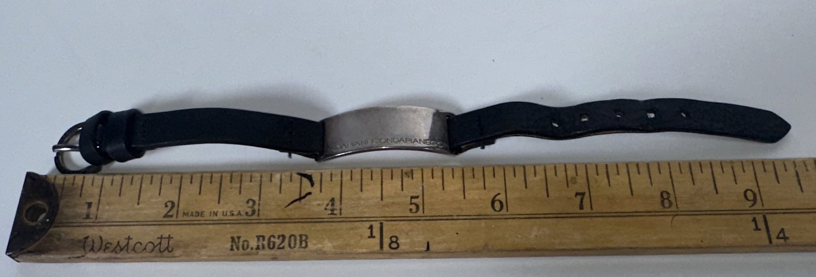 Pianegonda Sterling Silver ID plaque black leather bracelet: Pianegonda Sterling Silver ID plaque black leather bracelet This is a Pianegonda silver ID plate and leather band bracelet featuring an engraved sterling silver plaque. For this lot shipping can be do