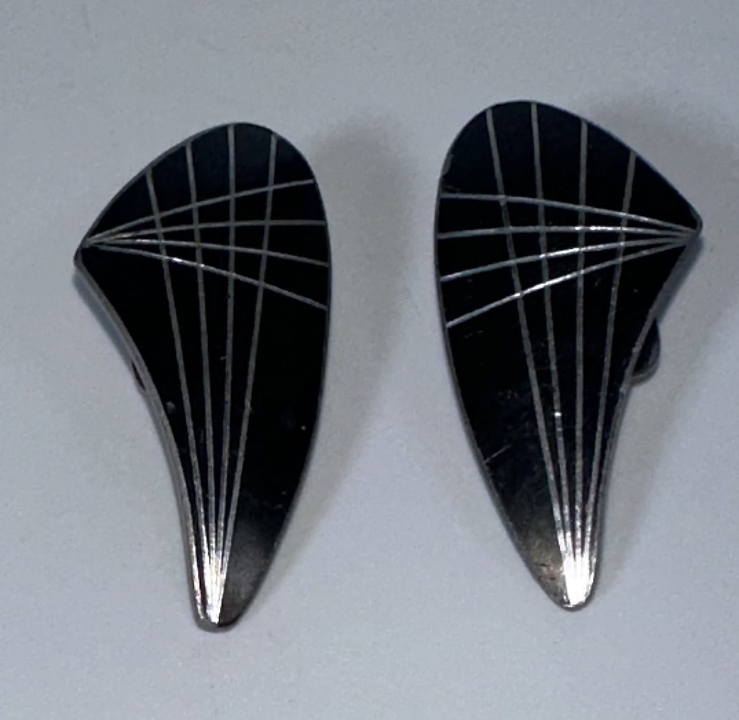Jorgen Jensen Vintage Pewter Enamel Clip Earrings: Jorgen Jensen Vintage Pewter Enamel Clip Earrings Crafted in Denmark during the mid-century modernist era, this specific atomic geometric style features a wing or teardrop shape made of dark-finished 