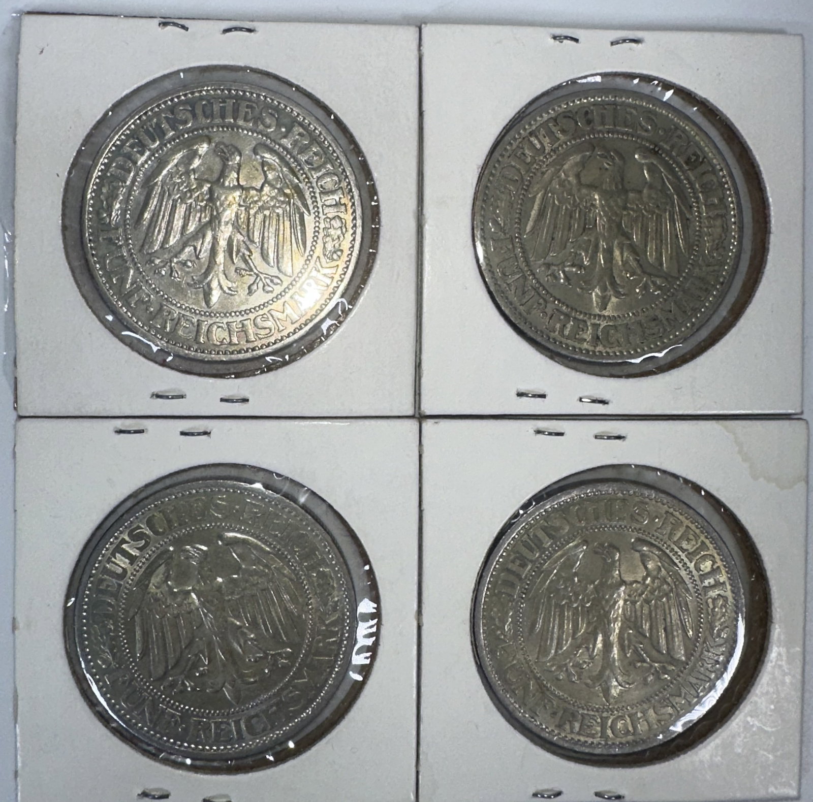 Four German Weimar Republic 5 Reichsmark Silver Coins: Four German Weimar Republic 5 Reichsmark Silver Coins Four German Weimar Republic 5 Reichsmark silver coin featuring the national eagle and the inscription FUNF REICHSMARK. All four coins date from 19