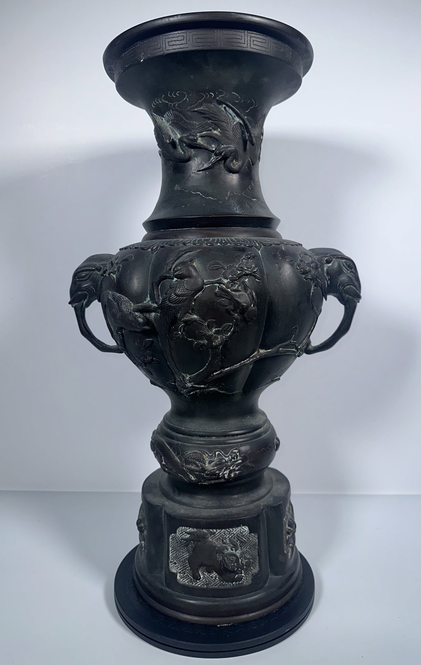 Large Vintage Japanese Meiji Style Urn with Elephants: Large Vintage Japanese Meiji Style Urn with Elephants This is a large vintage piece done in the style of a Meiji-period Japanese patinated bronze baluster vase featuring high-relief bird-and-branch mo