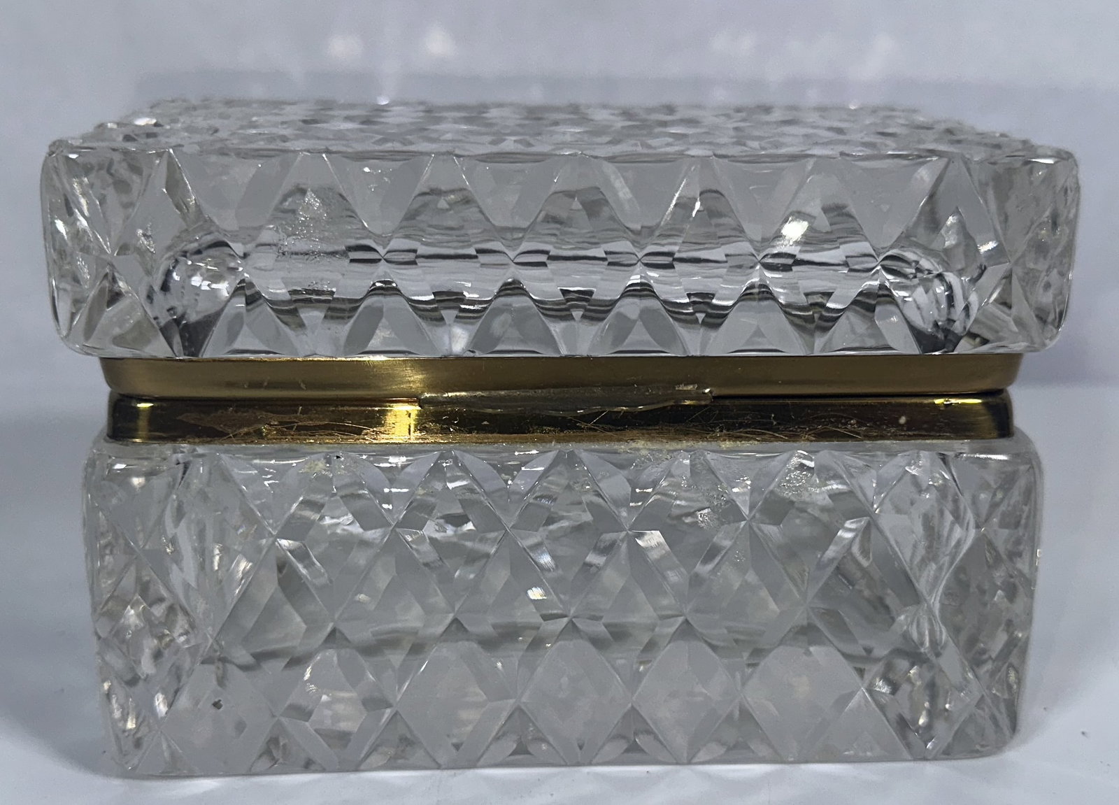 Cut Glass Rectangular Jewelry Casket: Cut Glass Rectangular Jewelry Casket This is a vintage French cut glass jewelry casket features a heavy diamond-faceted geometric pattern and a brass-trimmed hinged mount For this lot shipping can be 
