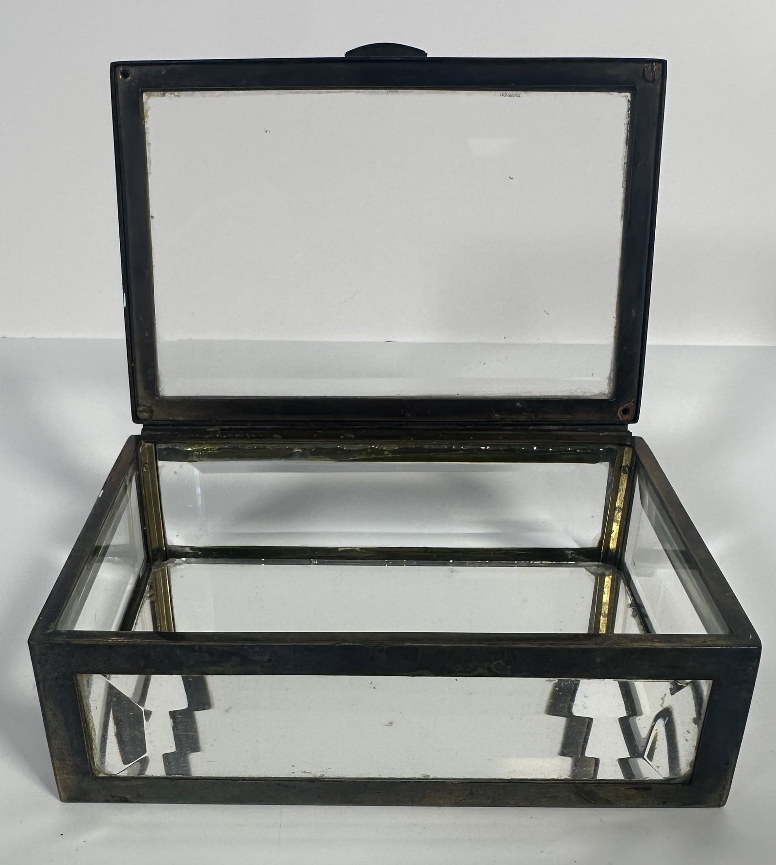 RR - Jewelry Casket - Silver Plate Frame Low Rectangle: Jewelry Casket - Silver Plate Frame Low Rectangle Beveled glass jewelry casket with a silver plated frame. Early 20th Century. For this lot shipping can be done one of two ways: In-House Shipping - A 