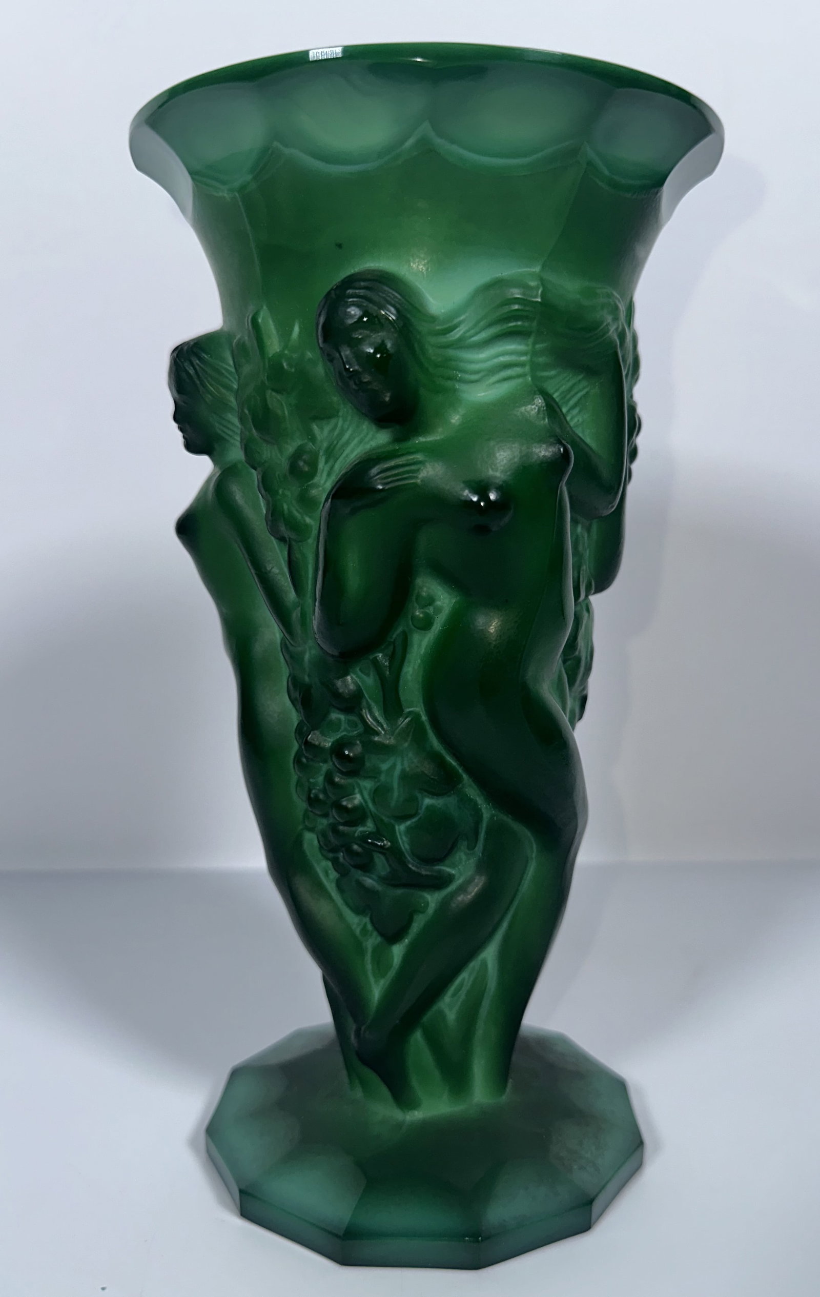 Malachite Glass Bacchanetes Vase 8 Inches Tall: Malachite Glass Bacchanetes Vase 8 Inches Tall This is a vintage Art Deco green malachite pressed glass Grape Harvest or Bacchantes motif vase designed by Franta Pazourek for Curt Schlevogts Ingrid li