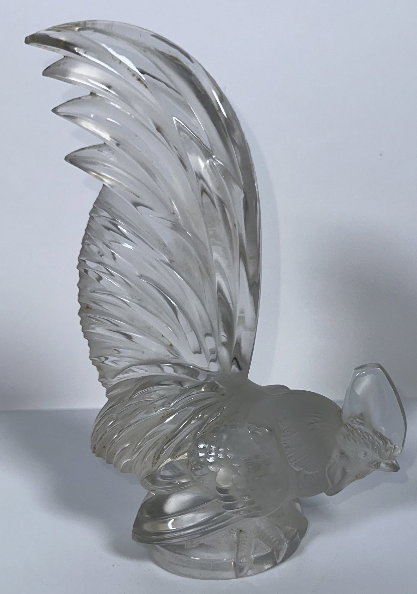Lalique Frosted Coq Nain Car Mascot Sculpture: Lalique Frosted Coq Nain Car Mascot Sculpture This is the vintage Coq Nain (Bantam Rooster) crystal sculpture, originally designed as an Art Deco car mascot/hood ornament by Ren? Lalique in 1928. Late