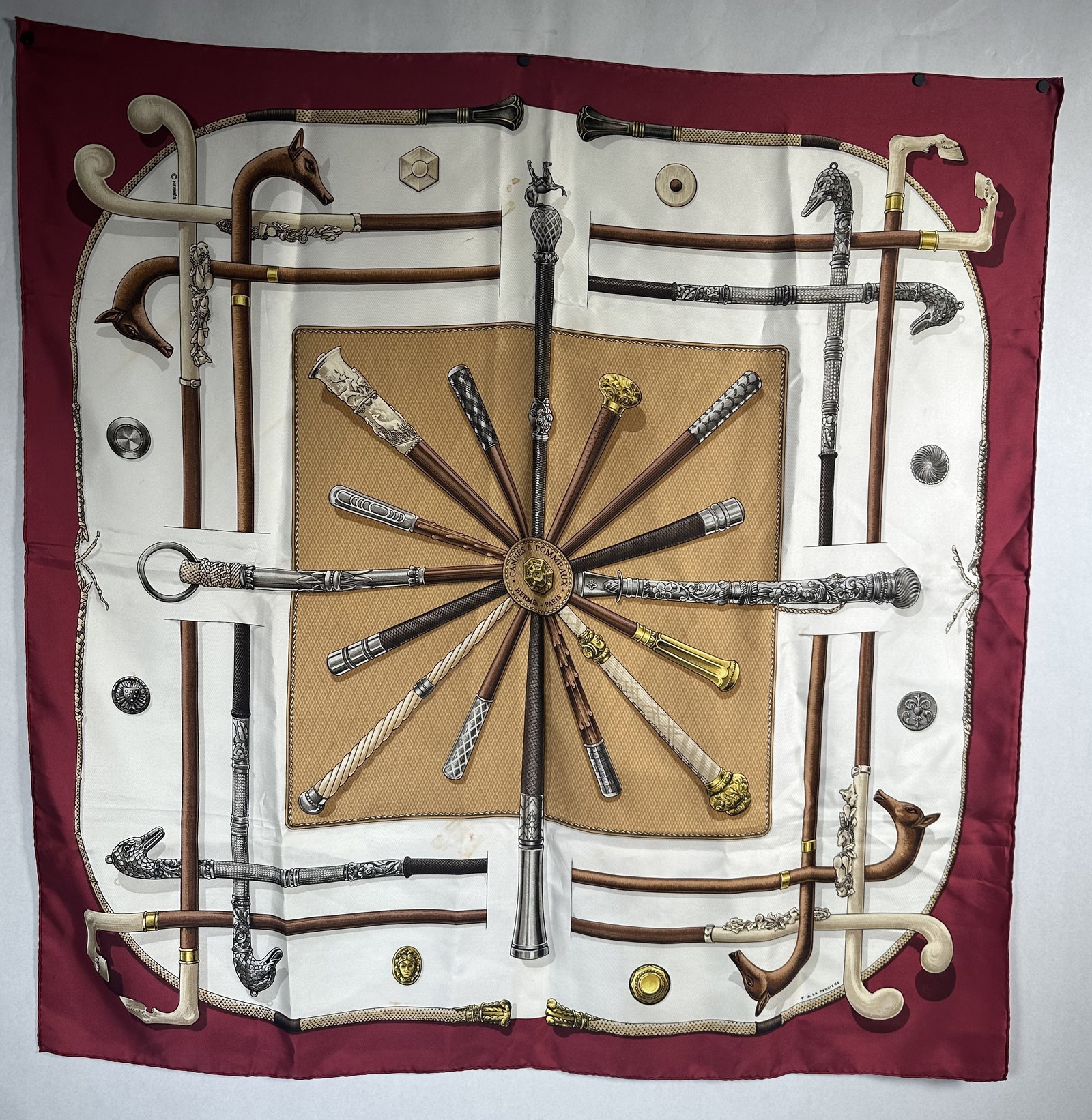 Vintage Hermes Scarf Cannes et Pommeaux: Vintage Hermes Scarf Cannes et Pommeaux This is a vintage Herm?s Carr? 90 silk twill scarf titled Cannes et Pommeaux (Canes and Knobs), originally designed by Fran?oise de la Perri?re in 1985 and feat