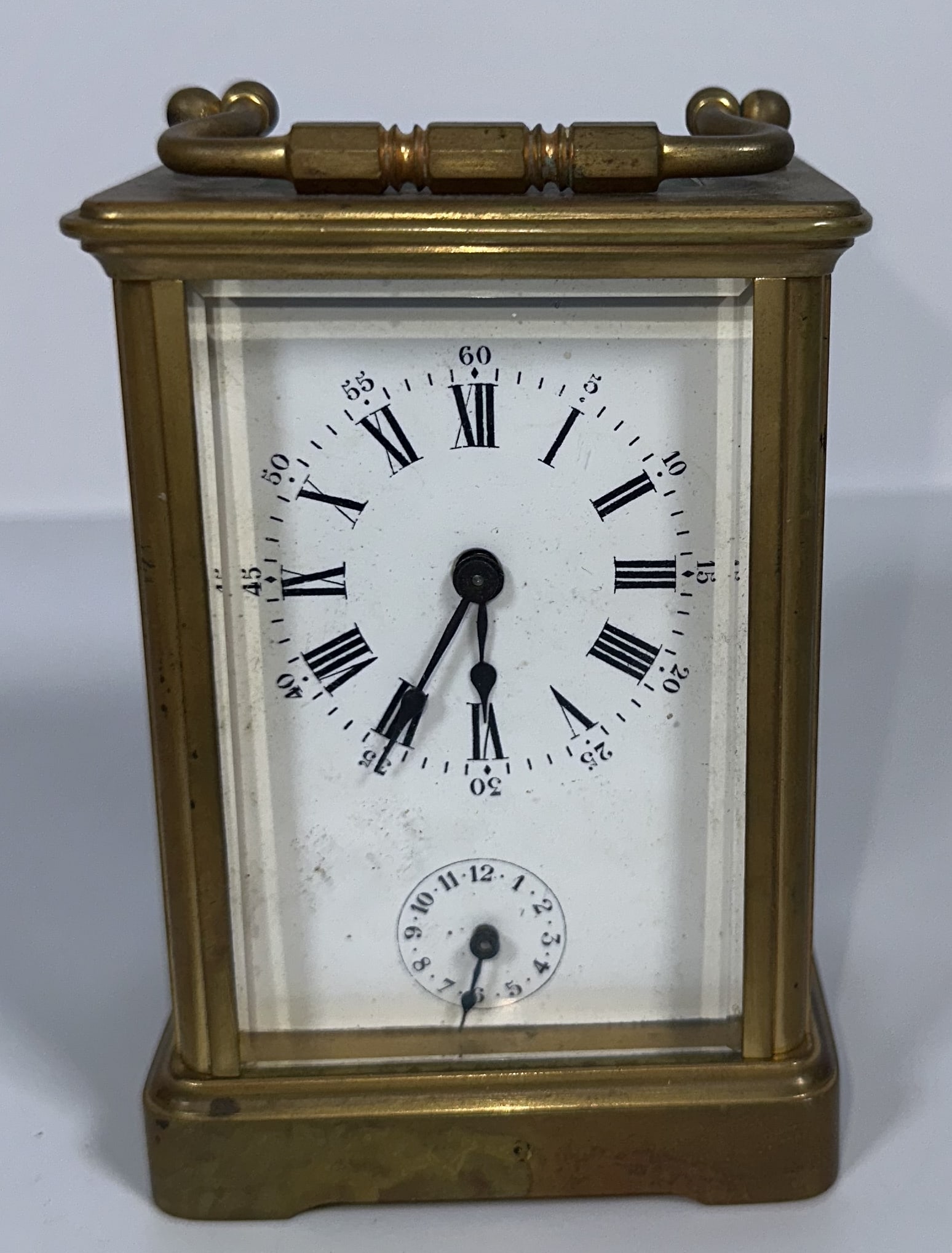 Carriage Clock with Chime and Alarm: Carriage Clock with Chime and Alarm Traditional brass and beveled glass carriage clock. This clock features a chime and alarm. For this lot shipping can be done one of two ways: In-House Shipping - A 