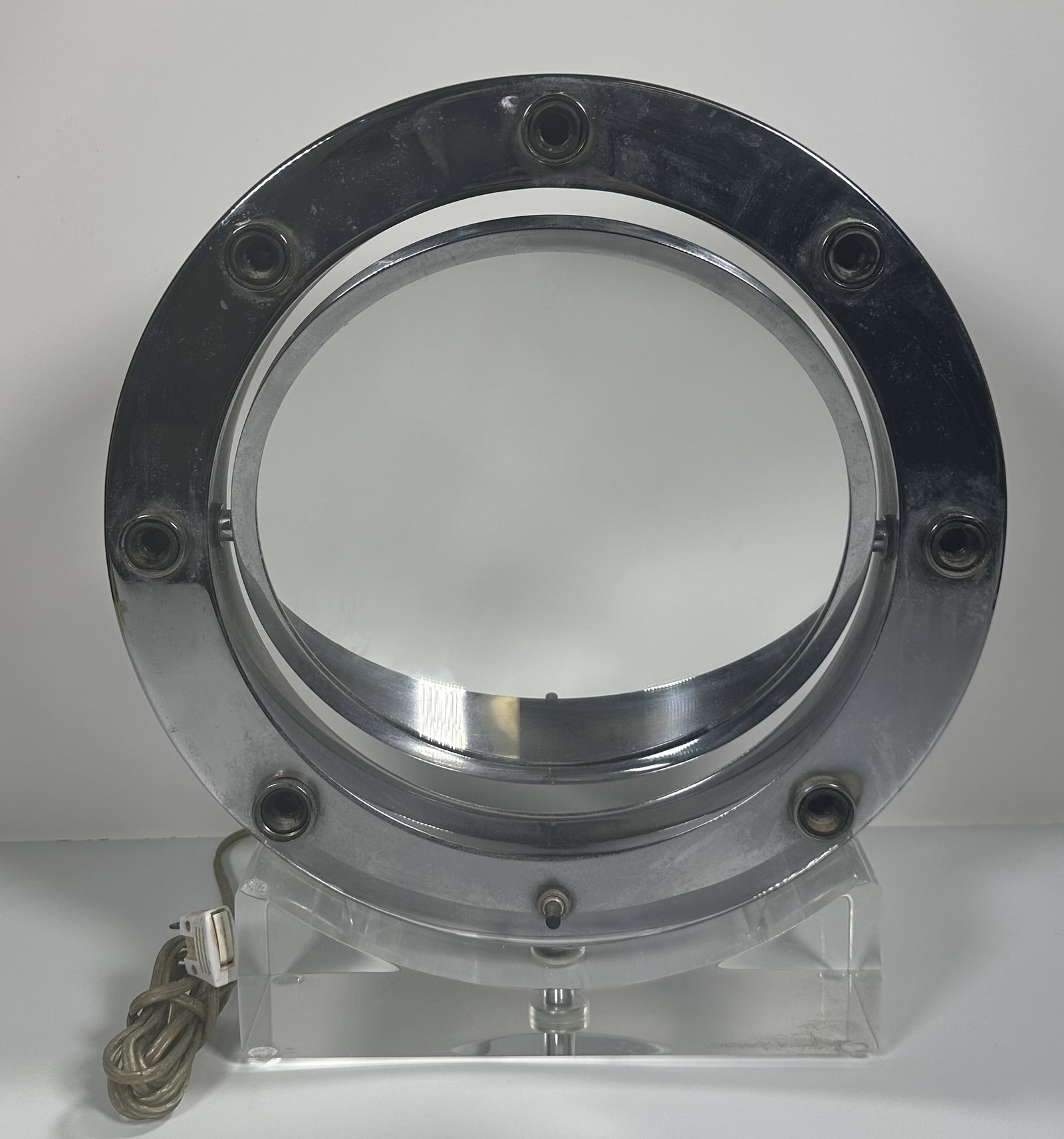 Large Mid Century Lighted Mirror: Large Mid Century Lighted Mirror This vintage mid-century modern Charles Hollis Jones illuminated vanity mirror features a circular chrome frame with accent bulb sockets mounted on a clear acrylic (Lu
