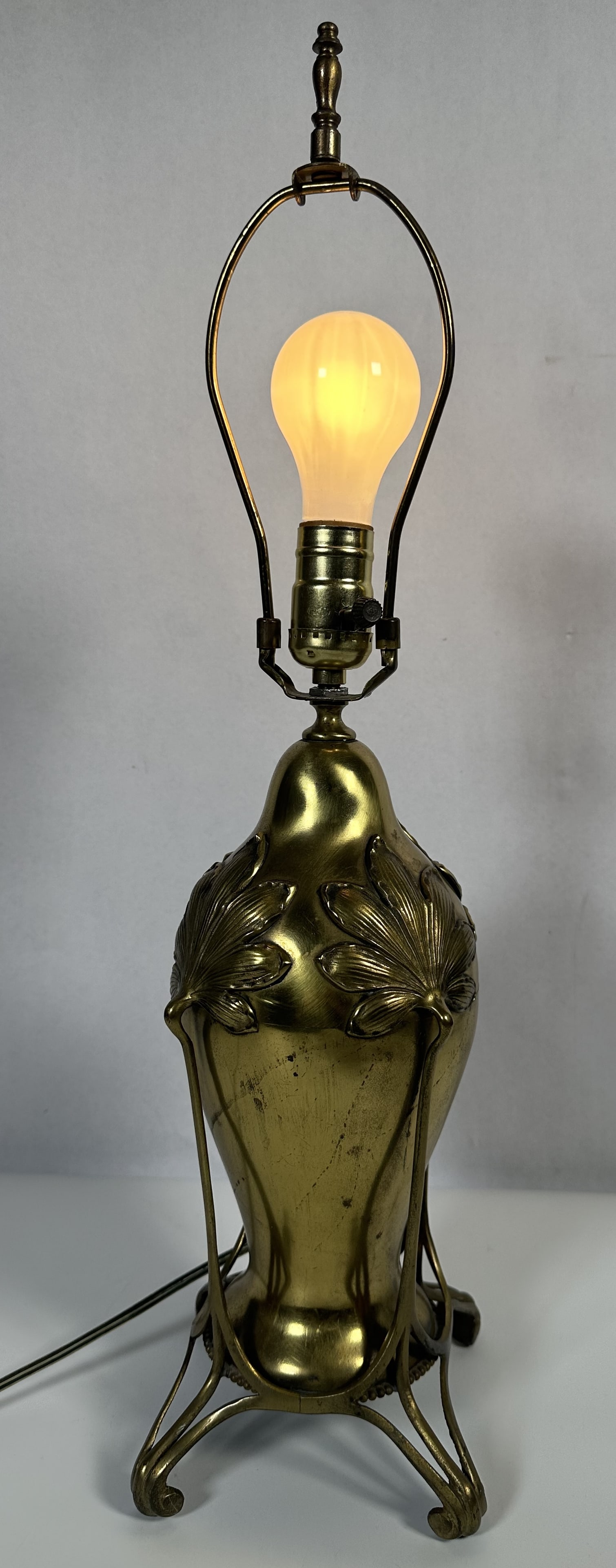 RR Antique Bradley and Hubbard Working Lamp: Antique Bradley and Hubbard Working Lamp This elegant piece is an antique Art Nouveau sculptural table lamp base, featuring organic stylized leaf accents and a tripodal base structure by Bradley and