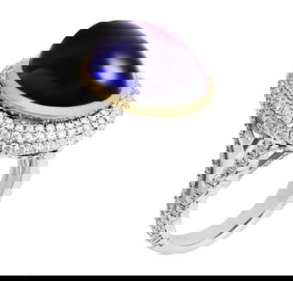 GIA Certified 26.37 Carat Oval Tanzanite Cabochon Diamond Cocktail Ring: GIA Certified 26.37 Carat Oval Tanzanite Cabochon Diamond Cocktail RingCrafted in 18K White Gold & 18K Yellow Gold prongsSize 6 (can be sized)A Exceptional Handmade Statement piece, 18k White Gold Hig
