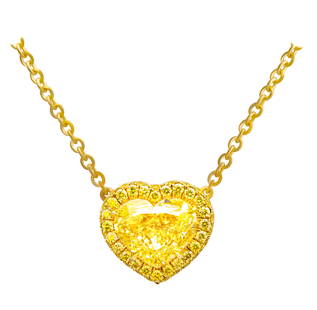 GIA Certified Heart-Shaped Pendant with Fancy Light Yellow Diamond in 18K Yellow Gold: This exquisite pendant by M&V Vanguard features a stunning 5.00-carat GIA Certified Fancy Light Yellow Heart Shape Diamond, graded SI1 for clarity (GIA# 6442423550). The vibrant center stone is beauti