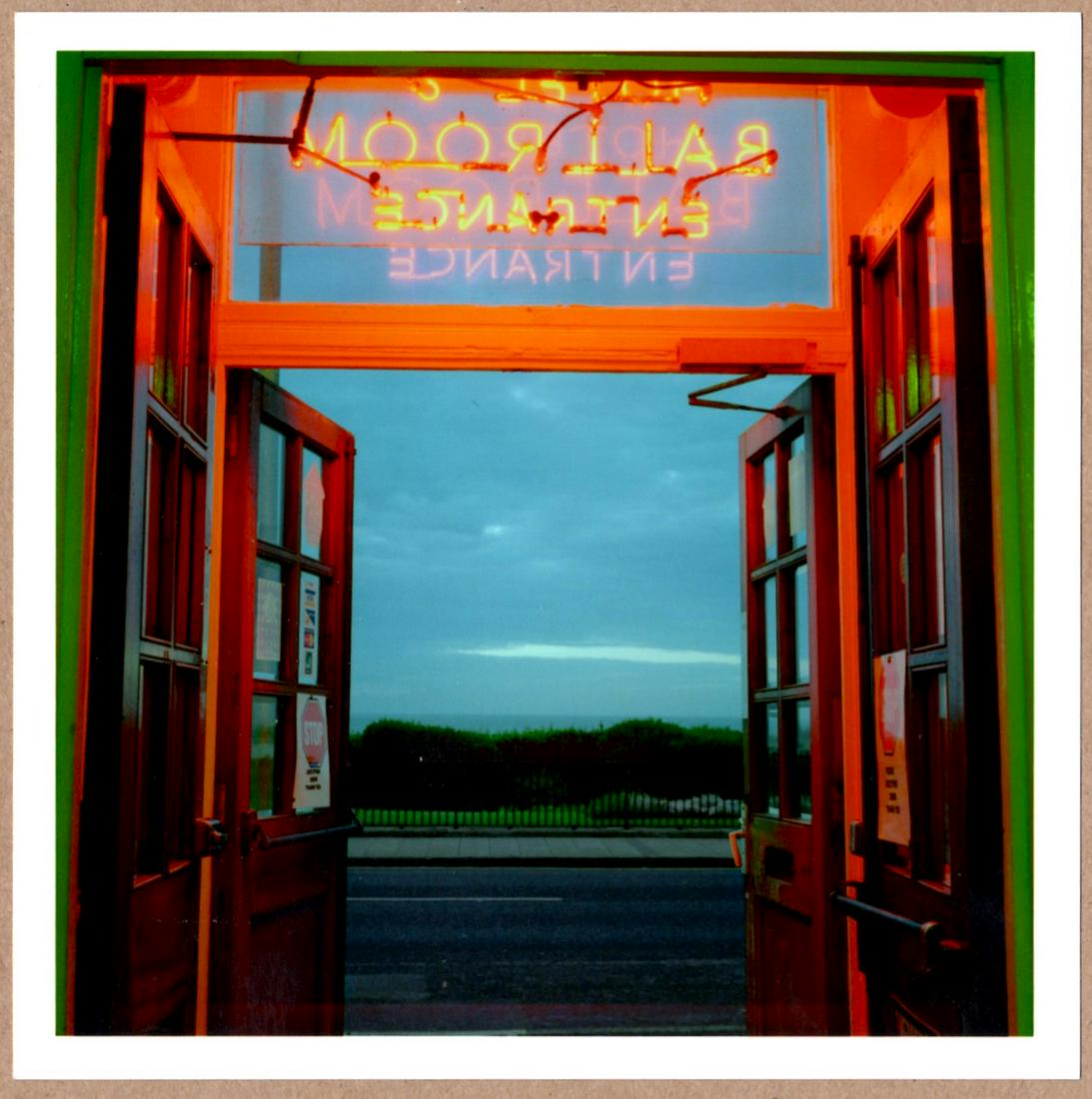 ESTATE STAMPED - PETER MARLOW BALLROOM ENTRANCE MARGATE ENGLAND 2002 6"x 6" MAGNUM PRINT.: Description: 6"x 6" limited edition Fuji Crystal Archival Matte paper print. Image size is 5.5" on the longest side and the paper size is 6" x 6". The Print is ESTATE STAMPED on the verso.Condition: B