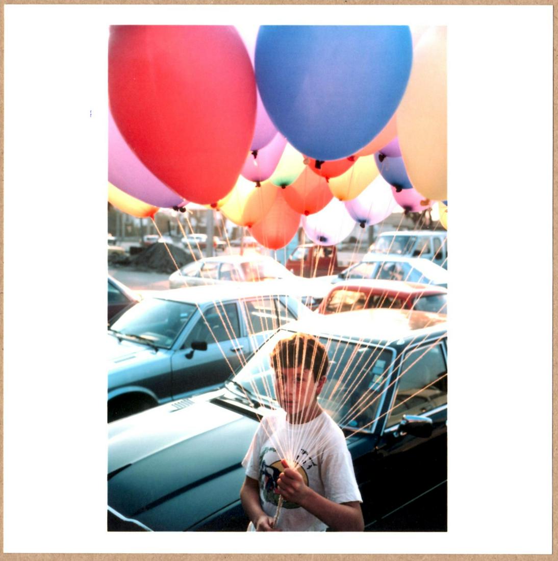 SIGNED - DAVID ALAN HARVEY - BOY WITH BALLOONS, SANTIAGO, CHILE. 1987 - LTD 6"x 6" MAGNUM ARCHIVAL (1 of 2)
