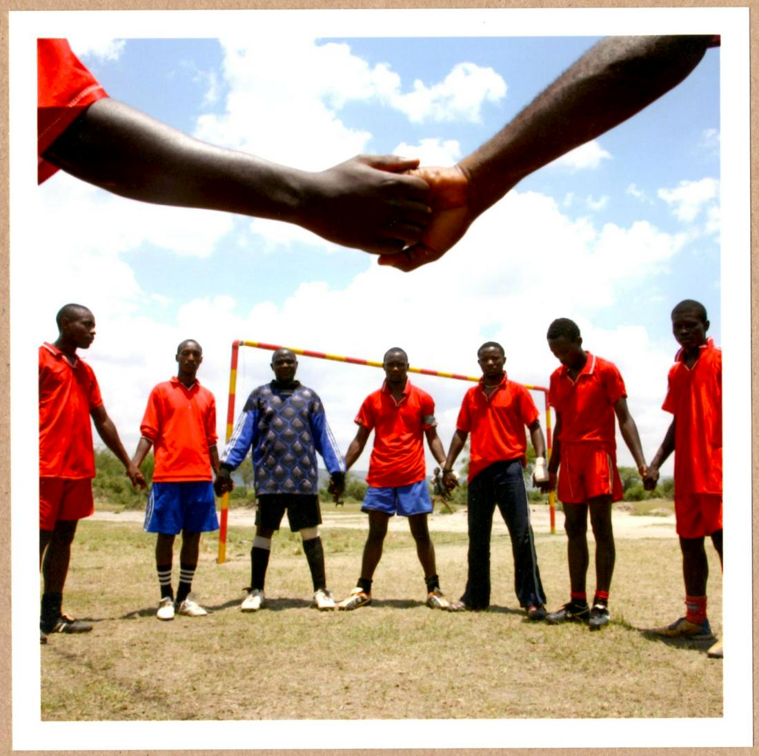 SIGNED - MIKHAEL SUBOTZKY - FOOTBALL, UGANDA, AFRICA 2008 6" x 6" MAGNUM PRINT.: Description: 6"x 6" limited edition Fuji Crystal Archival Matte paper print. Image size is 5.5" on the longest side and the paper size is 6" x 6". The Print is SIGNED by Mikhael Subotzky on the verso.