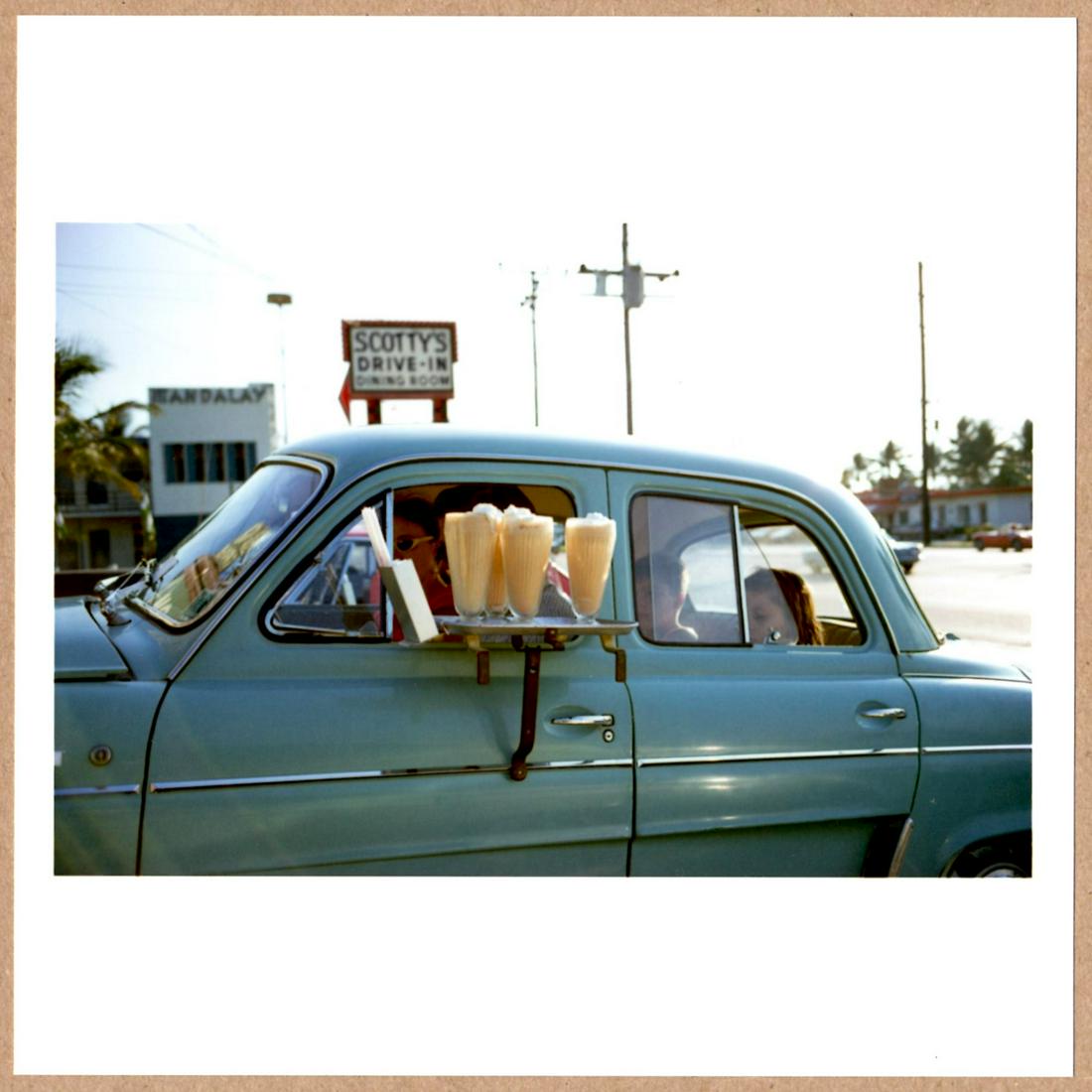 SIGNED JOEL MEYEROWITZ SCOTTY'S DRIVE IN LTD 6" x 6" APERTURE ARCHIVAL PRINT.: Description: 6"x 6" limited edition Fuji Crystal Archival Matte paper print. Image size is 5.5" on the longest side and the paper size is 6" x 6". The Print is SIGNED by Joel Meyerowitz on the verso.C