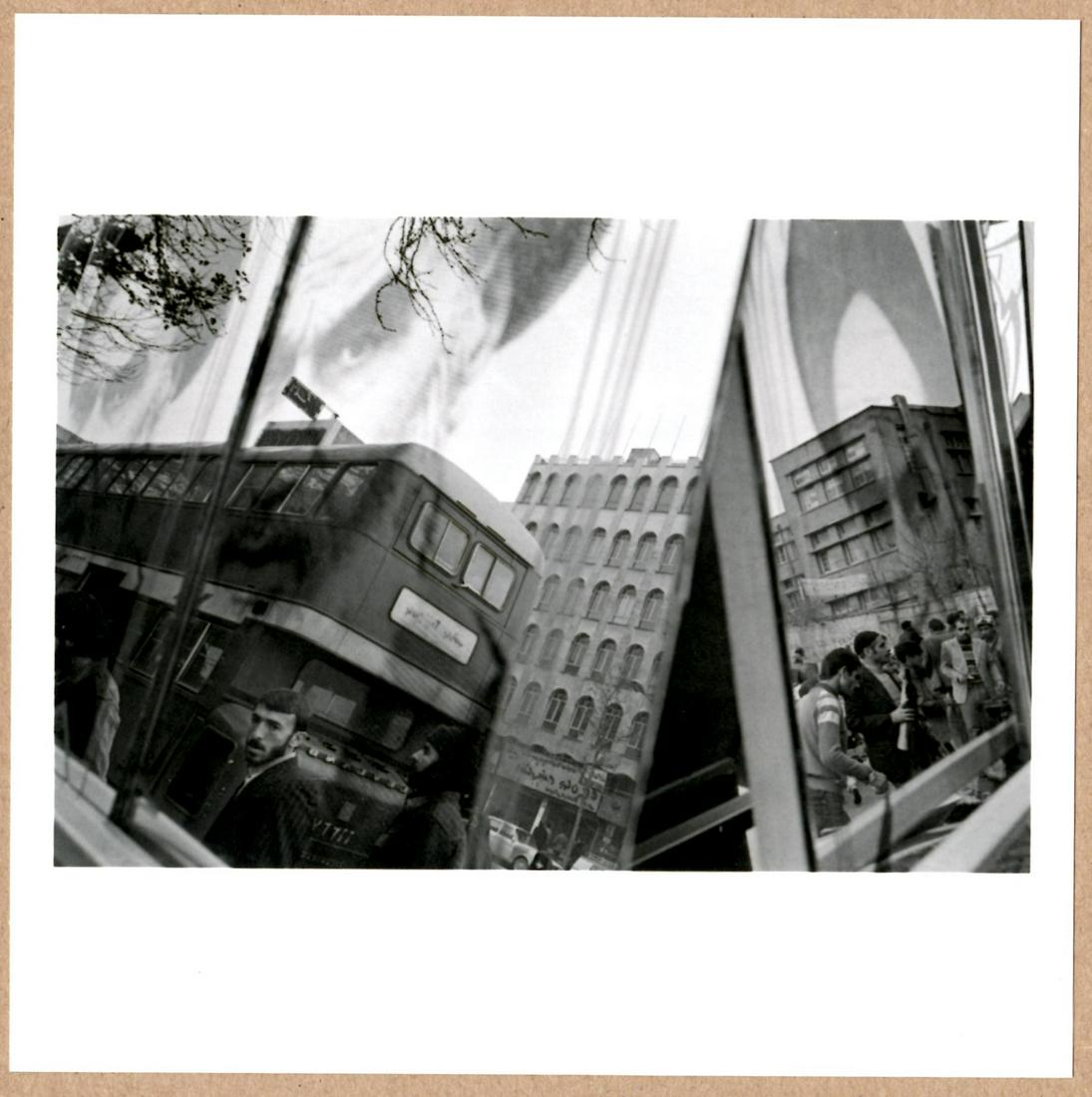 SIGNED - GILLES PERESS - MARKET STREET REFLECTION TELEX IRAN 6"x6" MAGNUM PRINT.: Description: 6"x 6" limited edition Fuji Crystal Archival Matte paper print. Image size is 5.5" on the longest side and the paper size is 6" x 6". The Print is SIGNED by Gilles Peress on the verso.Con
